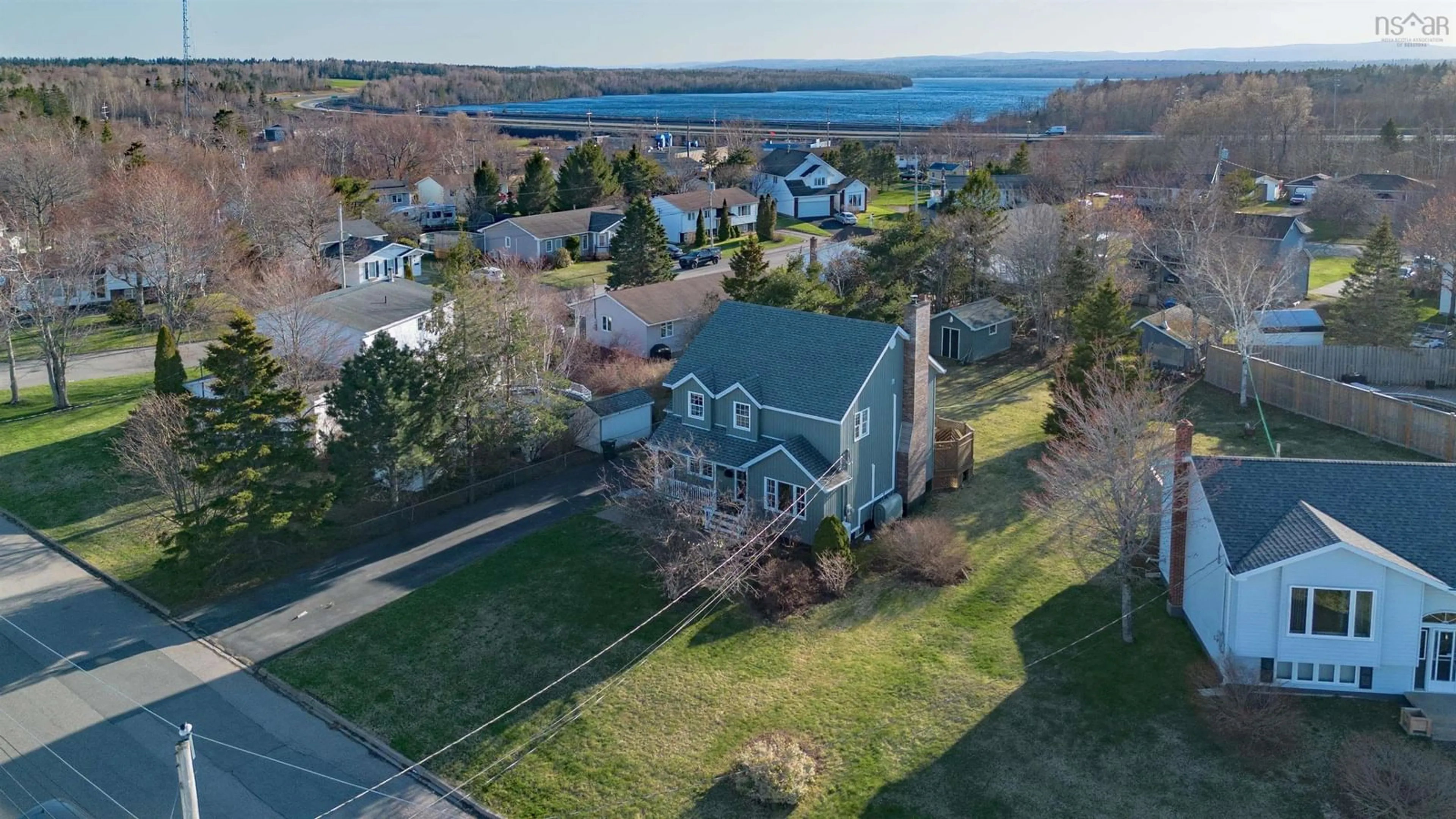 A pic from outside/outdoor area/front of a property/back of a property/a pic from drone, water/lake/river/ocean view for 20 Hodder Ave, North Sydney Nova Scotia B2A 3W9