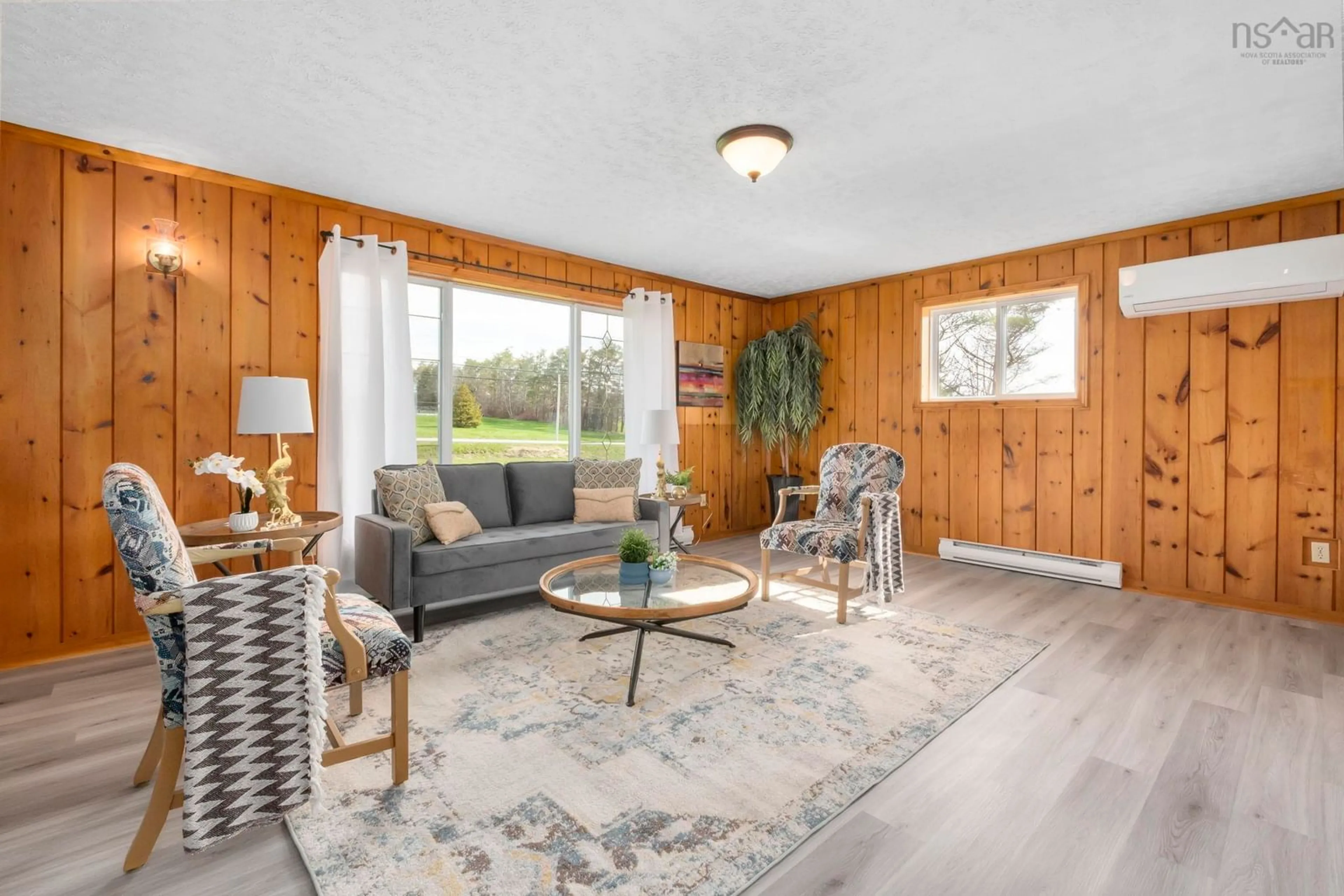 Living room with furniture, wood/laminate floor for 2849 Highway 215, Centre Burlington Nova Scotia B0N 2A0