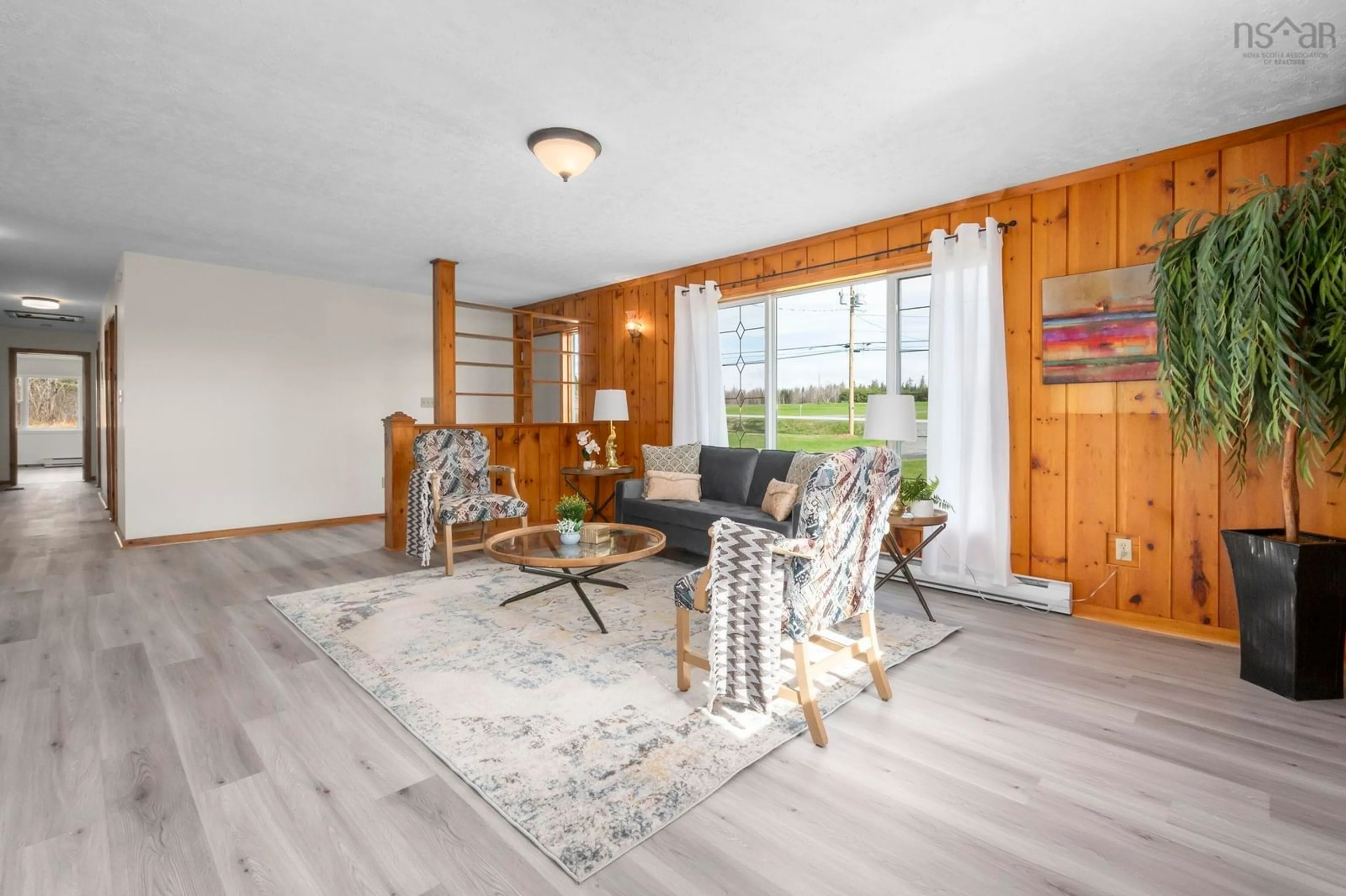 Living room with furniture, wood/laminate floor for 2849 Highway 215, Centre Burlington Nova Scotia B0N 2A0