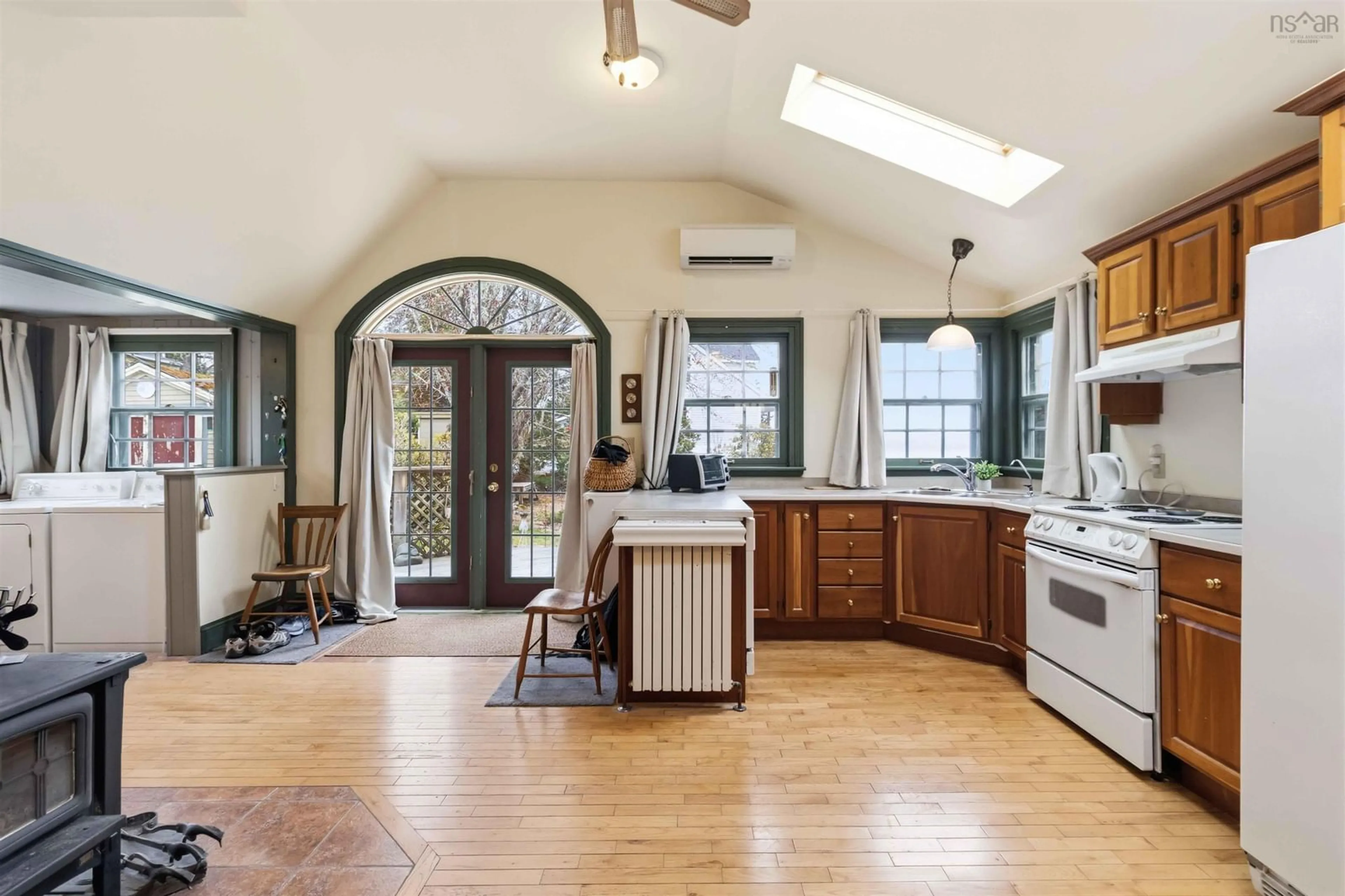 Open concept kitchen, ceramic/tile floor for 8502 St Margaret's Bay Rd, Black Point Nova Scotia B0J 1T0