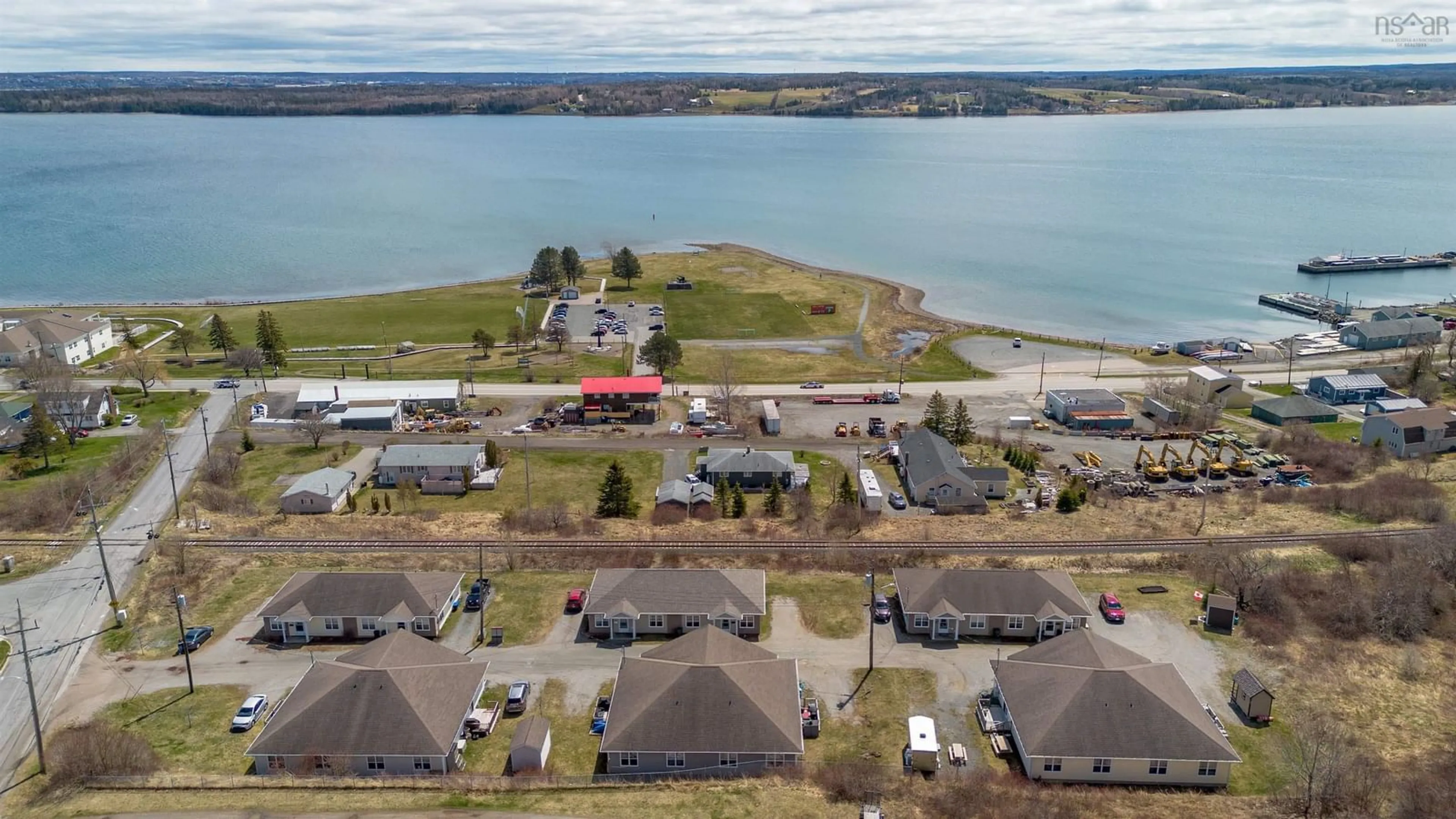 A pic from outside/outdoor area/front of a property/back of a property/a pic from drone, water/lake/river/ocean view for 3 Mosher Lane, Upper North Sydney Nova Scotia B2A 0B2