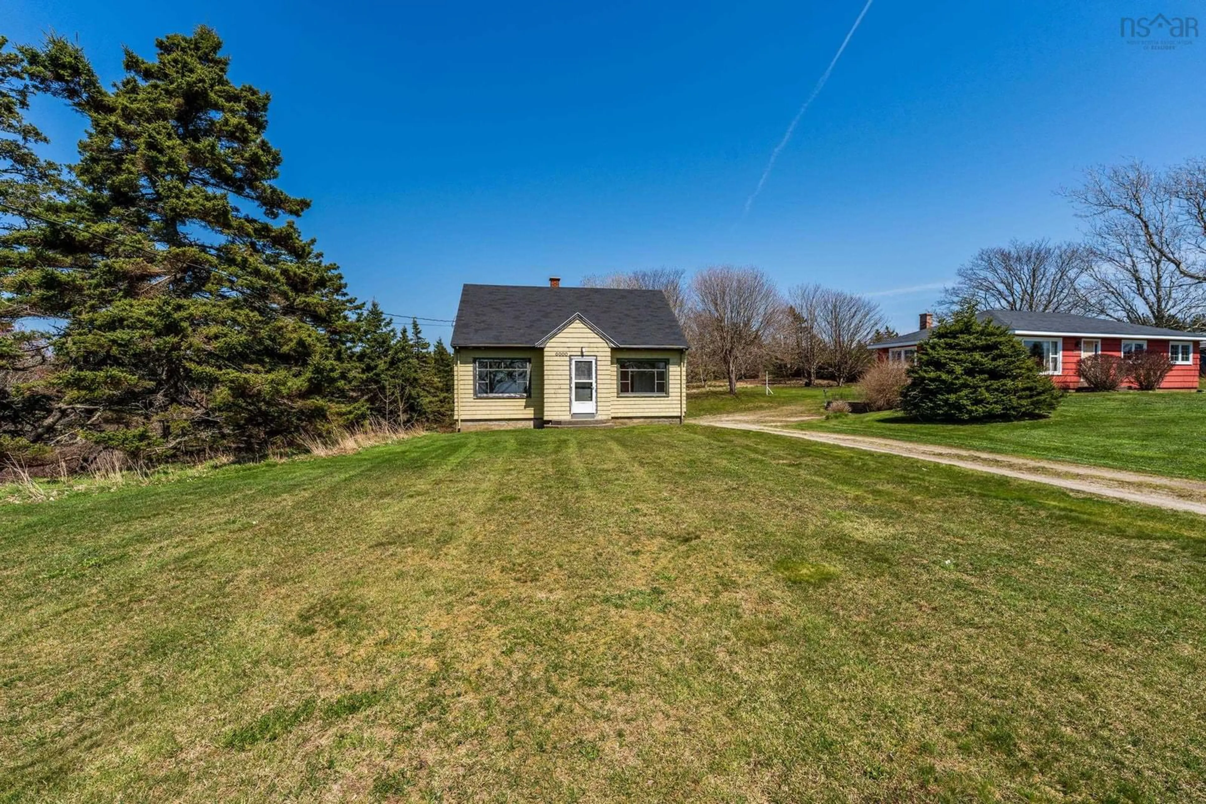 A pic from outside/outdoor area/front of a property/back of a property/a pic from drone, unknown for 6000 Highway 1, Mavillette Nova Scotia B5A 5B3