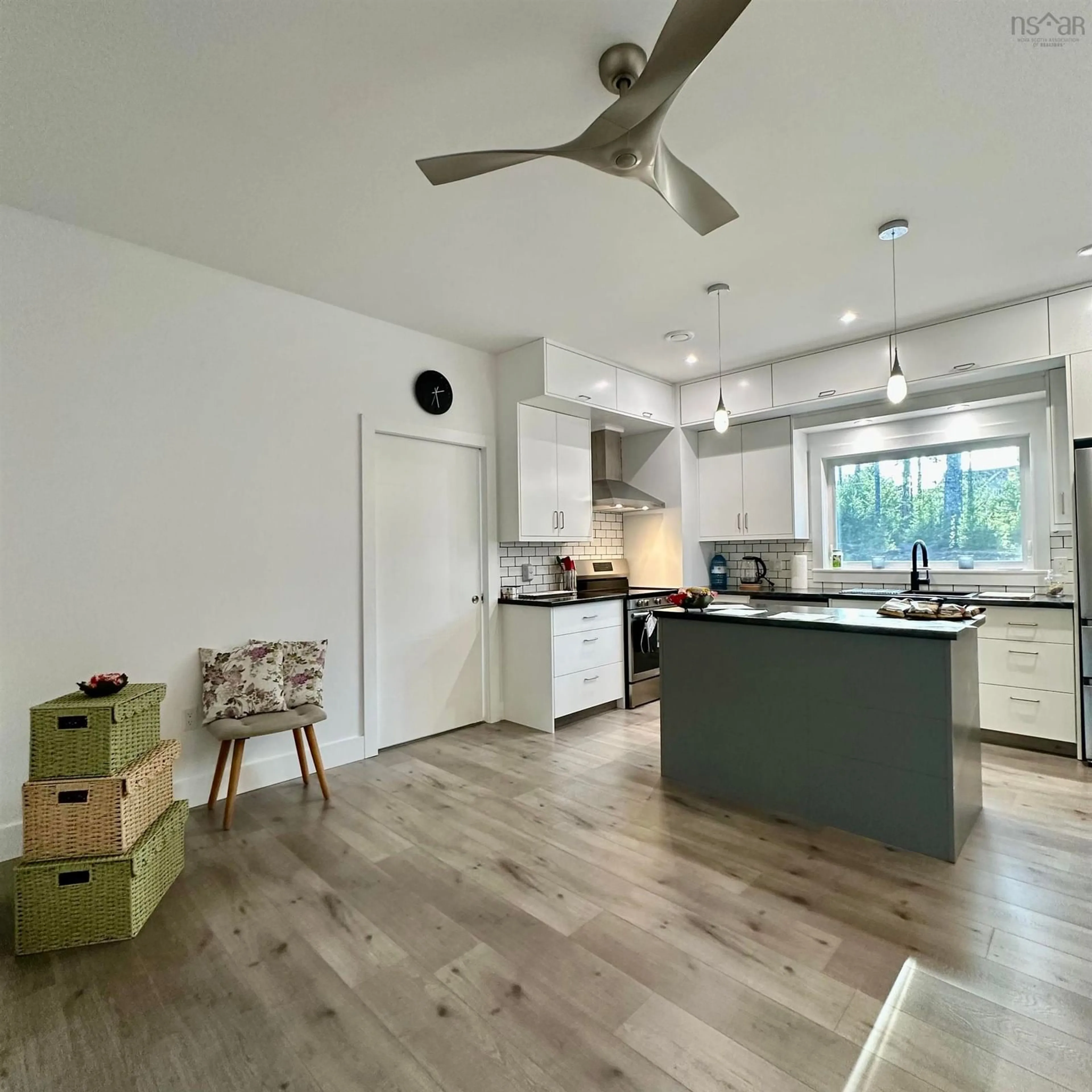 Open concept kitchen, wood/laminate floor for 75 Danica Dr, Pine Grove Nova Scotia B4V 7Z2