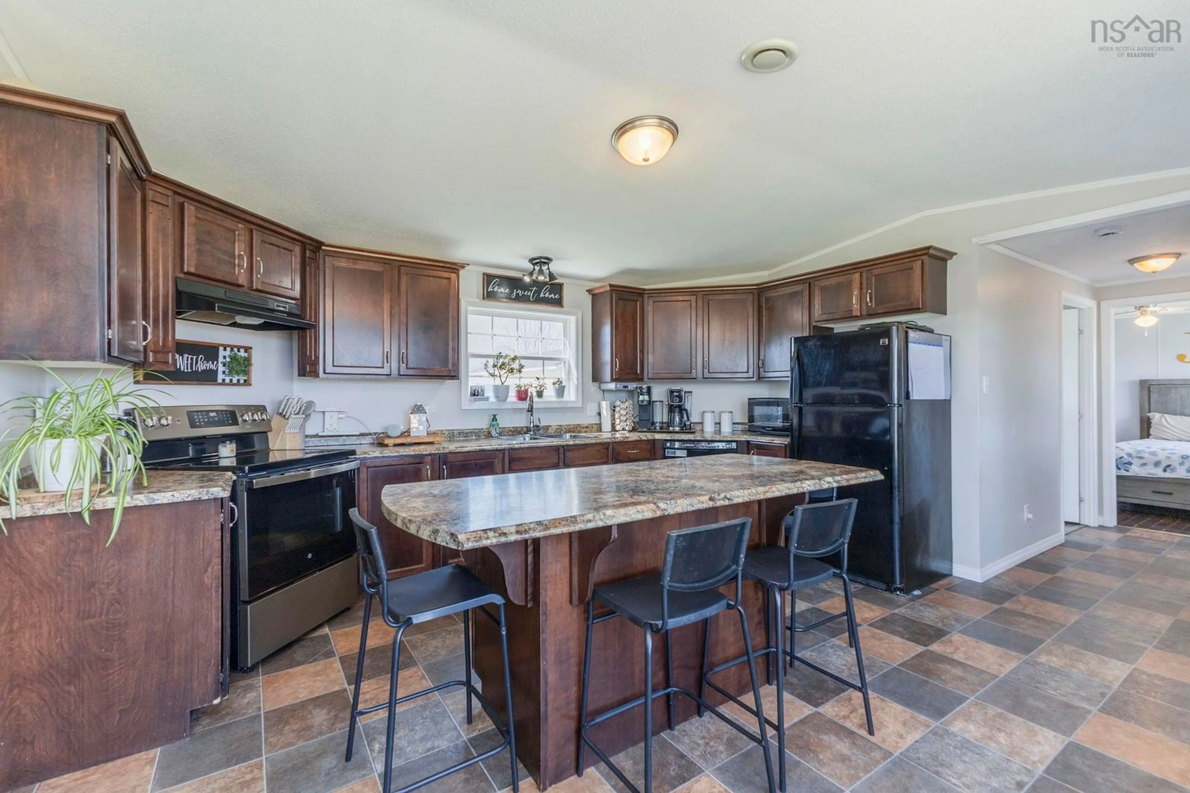Open concept kitchen, ceramic/tile floor for 18 Chisholm Rd Rd, Debert Nova Scotia B0M 1G0
