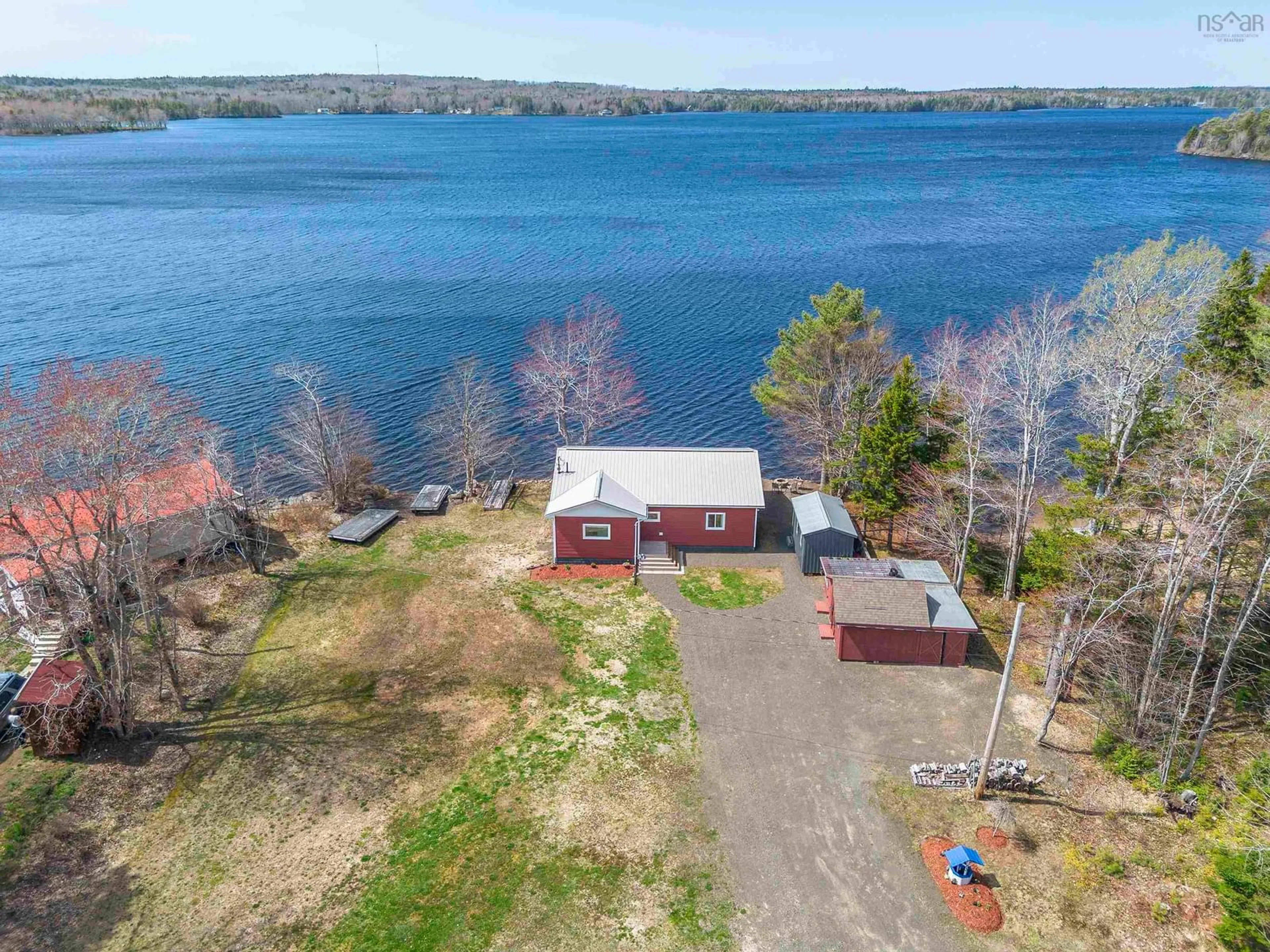 A pic from outside/outdoor area/front of a property/back of a property/a pic from drone, water/lake/river/ocean view for 63 Sand Pit Rd, South Range Nova Scotia B0W 1H0