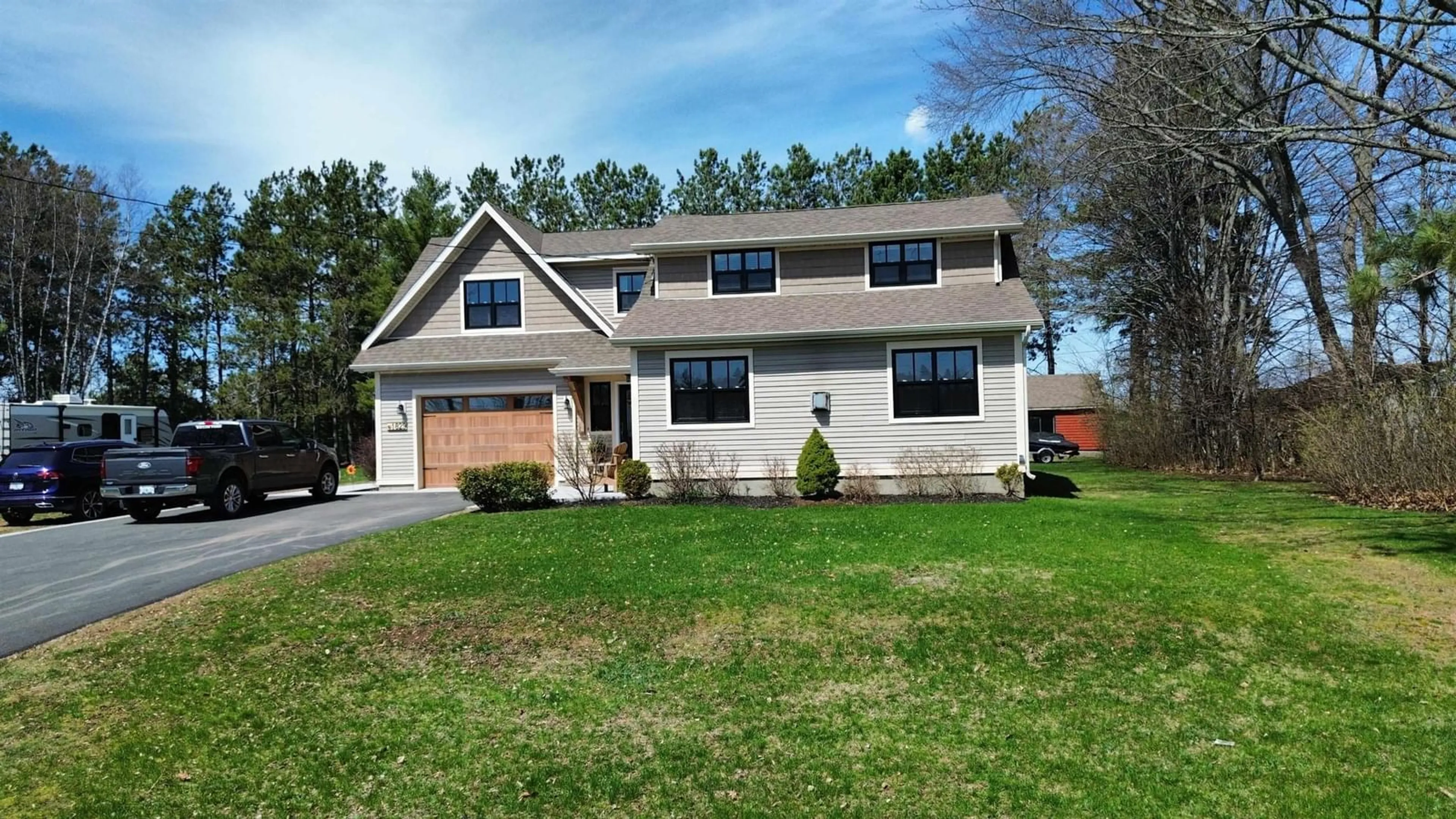 Home with vinyl exterior material, street for 1829 Black River Rd, Oxford Nova Scotia B0M 1P0