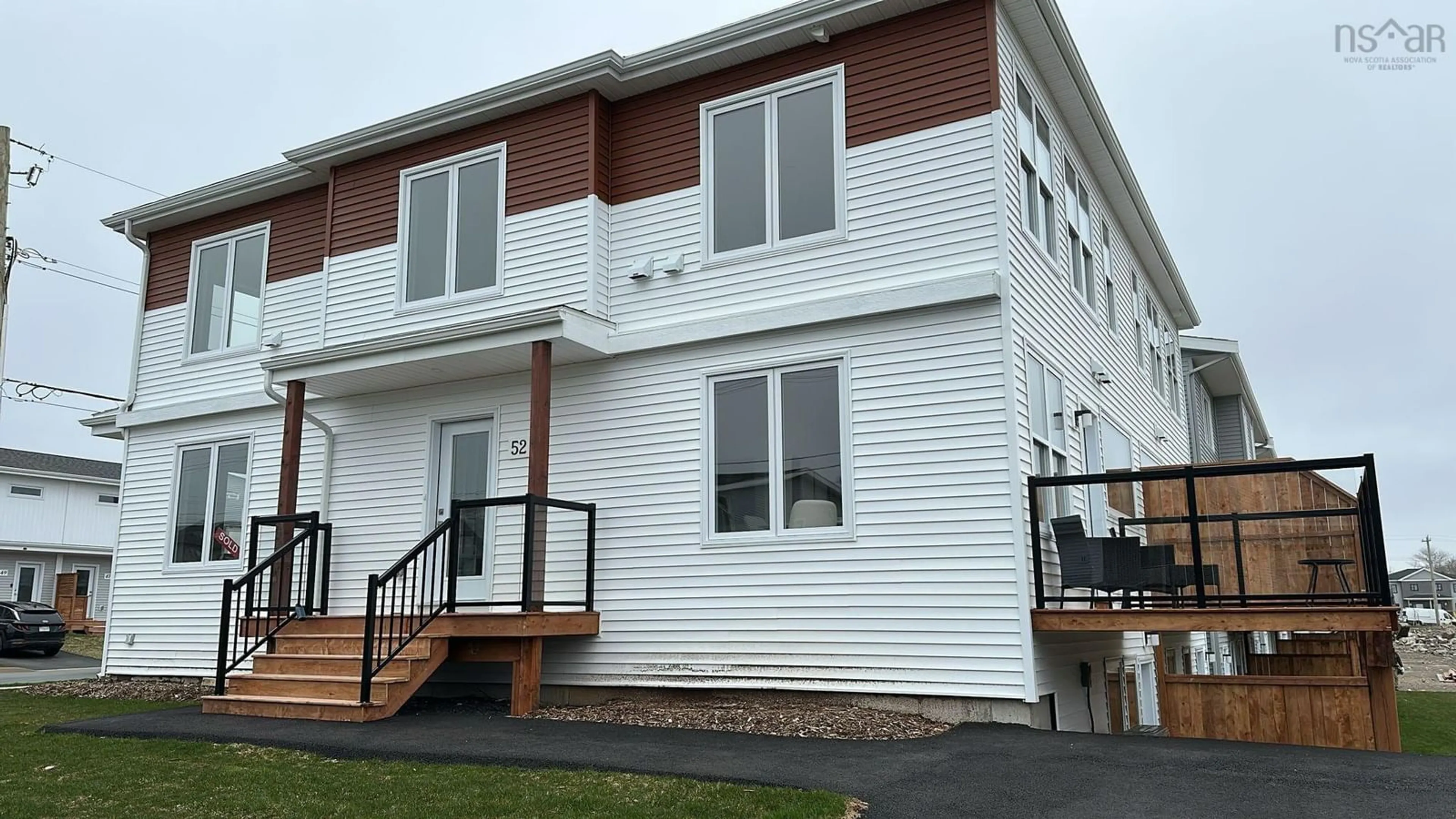 Home with vinyl exterior material, building for 52 Berm St, Herring Cove Nova Scotia B3R 0H2