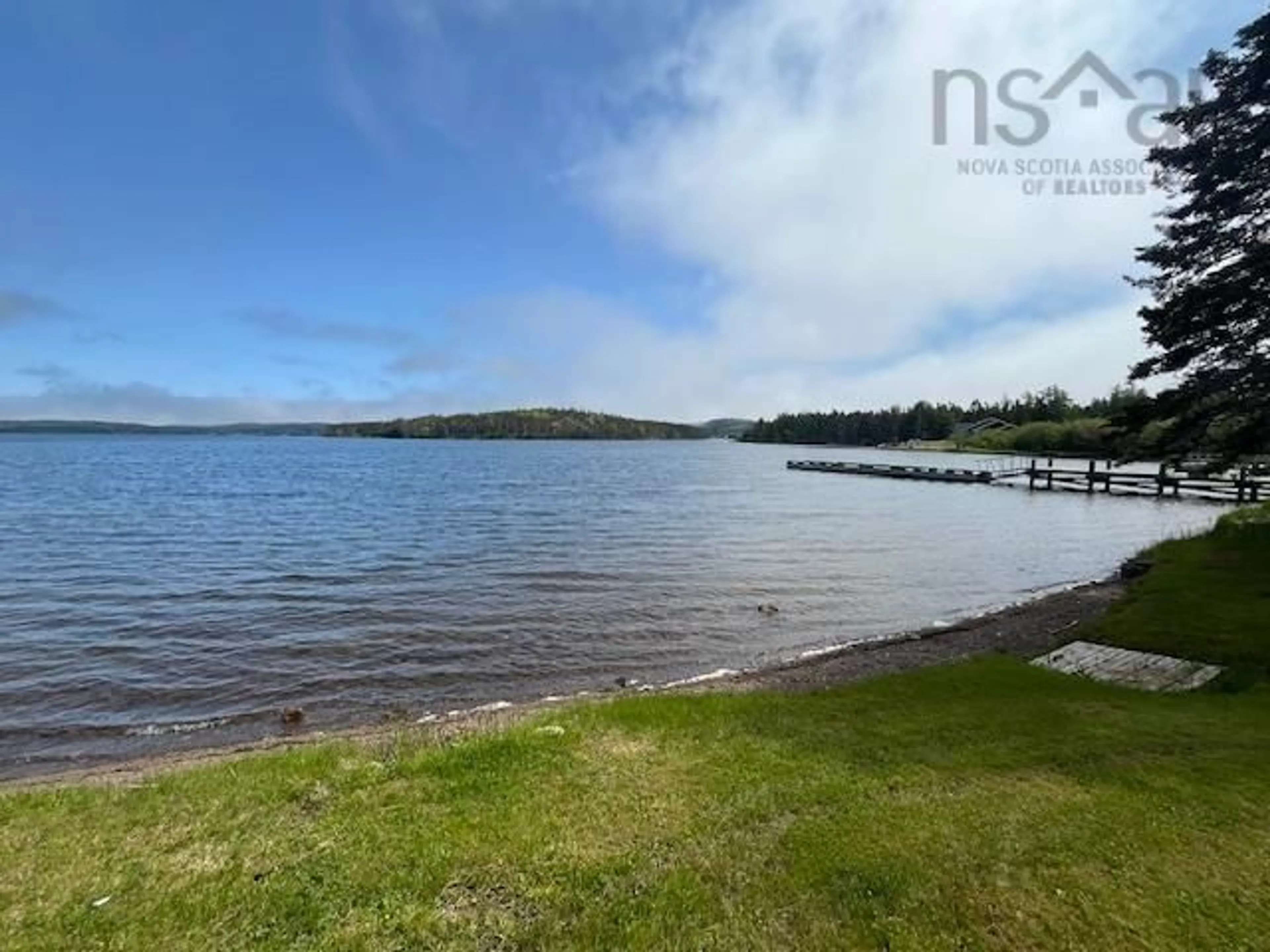 A pic from outside/outdoor area/front of a property/back of a property/a pic from drone, water/lake/river/ocean view for 8937 Pepperell St, St. Peter's Nova Scotia B0E 3B0