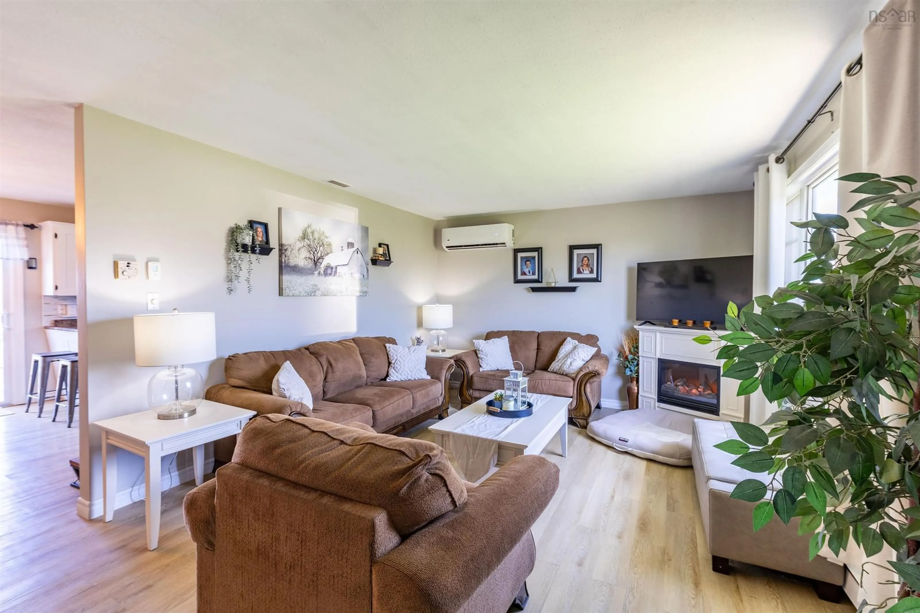 Living room with furniture, wood/laminate floor for 46 Heritage St, North Chegoggin Nova Scotia B5A 5K5