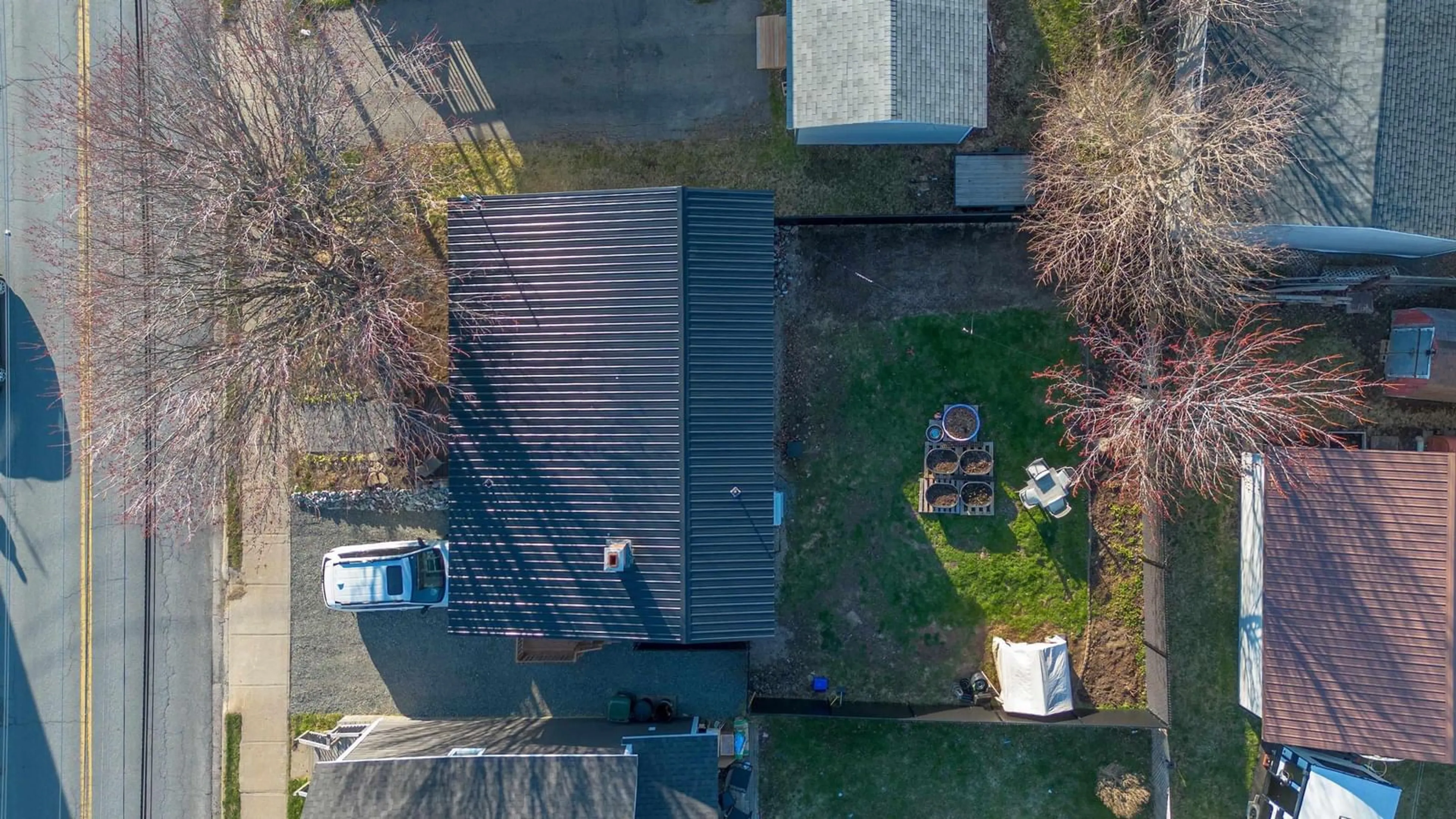 A pic from outside/outdoor area/front of a property/back of a property/a pic from drone, unknown for 69 Peppett St, North Sydney Nova Scotia B2A 2N7