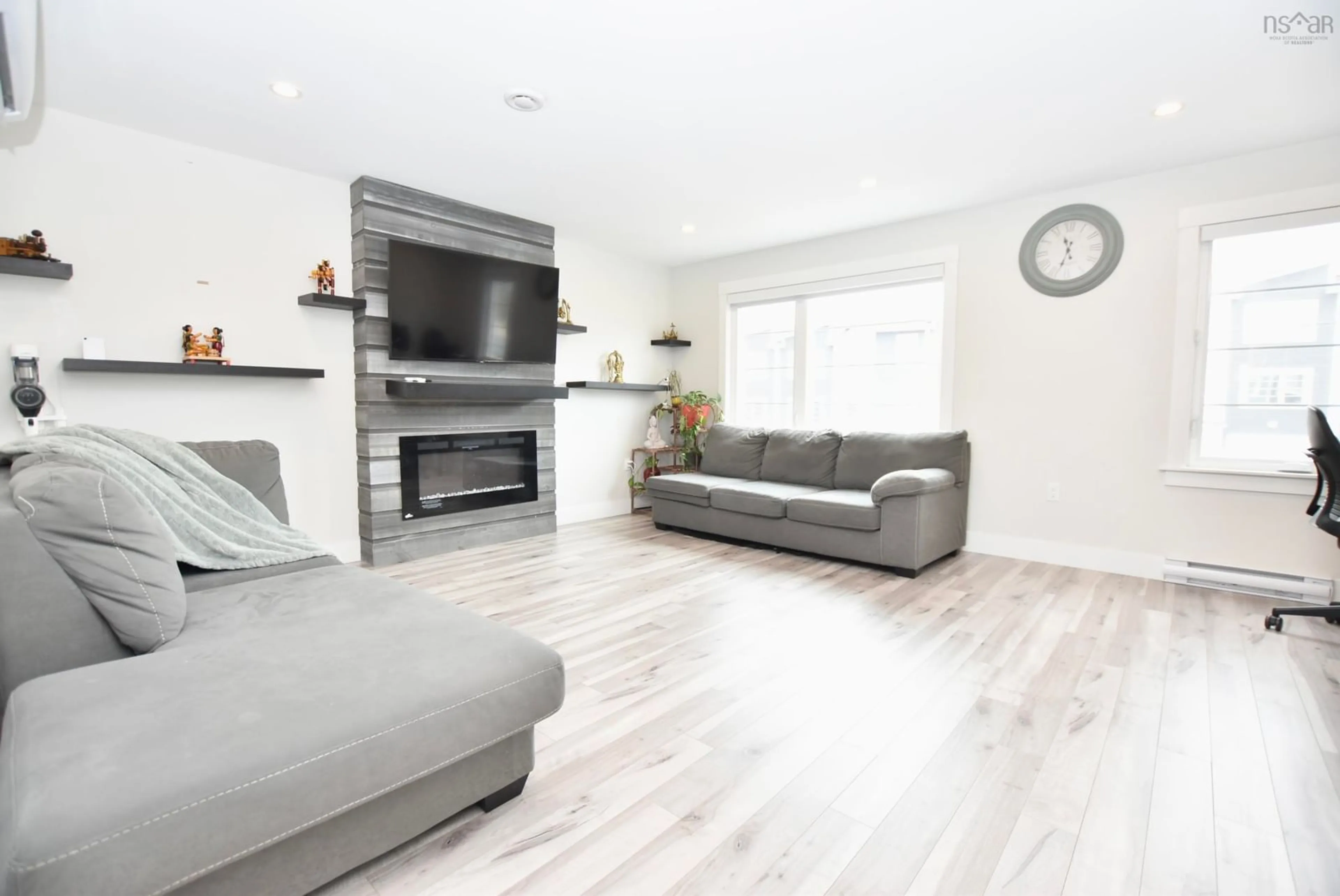Living room with furniture, wood/laminate floor for 17 Grosse St, Beechville Nova Scotia B3T 0M7