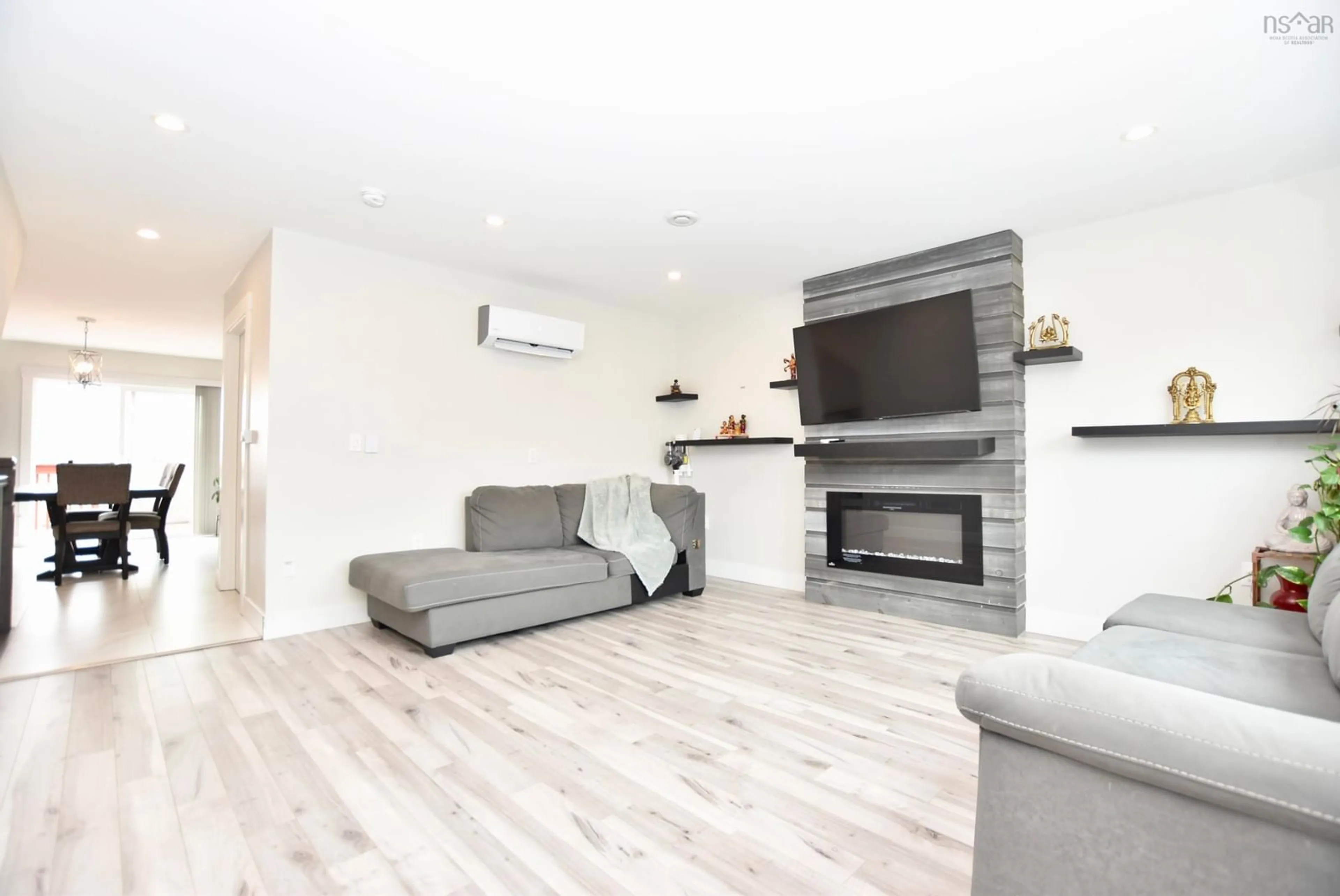 Living room with furniture, wood/laminate floor for 17 Grosse St, Beechville Nova Scotia B3T 0M7