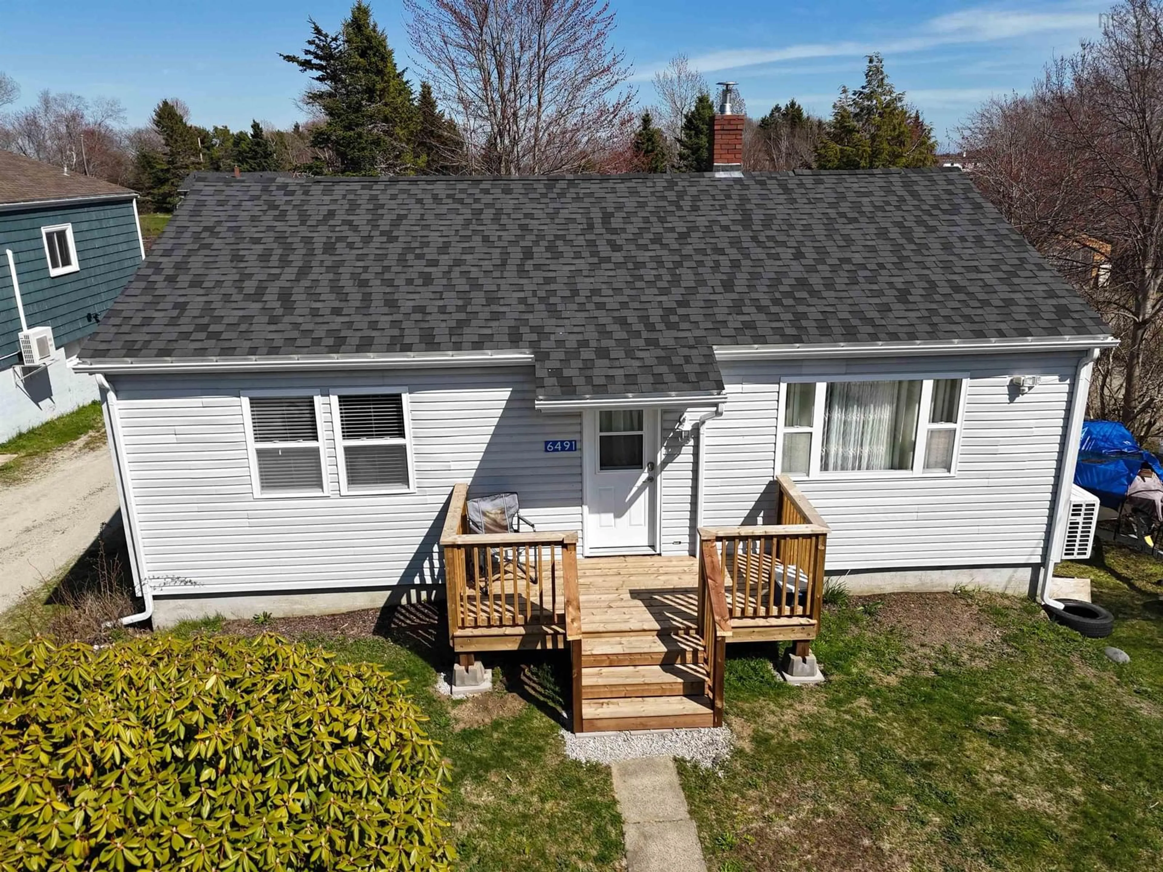 A pic from outside/outdoor area/front of a property/back of a property/a pic from drone, street for 6491 Highway 3, Western Shore Nova Scotia B0J 3M0