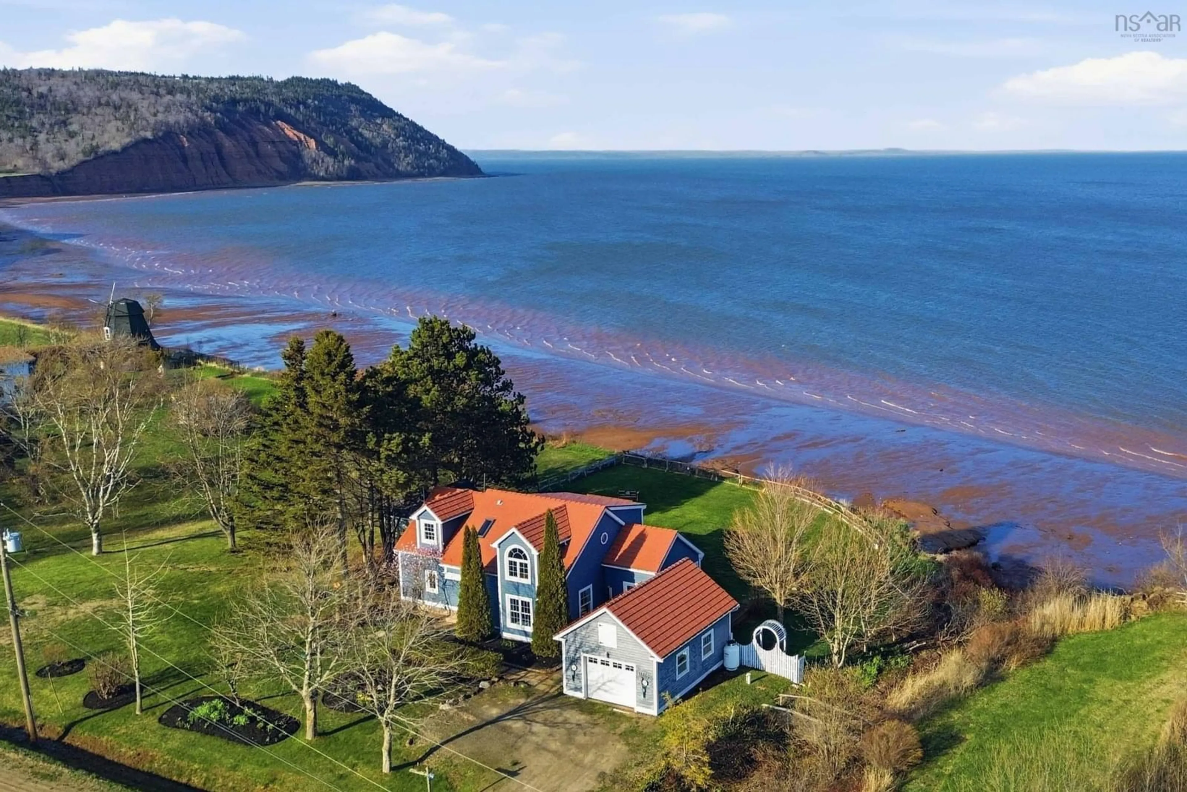 A pic from outside/outdoor area/front of a property/back of a property/a pic from drone, water/lake/river/ocean view for 79 Blomidon Crescent, Lower Blomidon Nova Scotia B0P 1H0