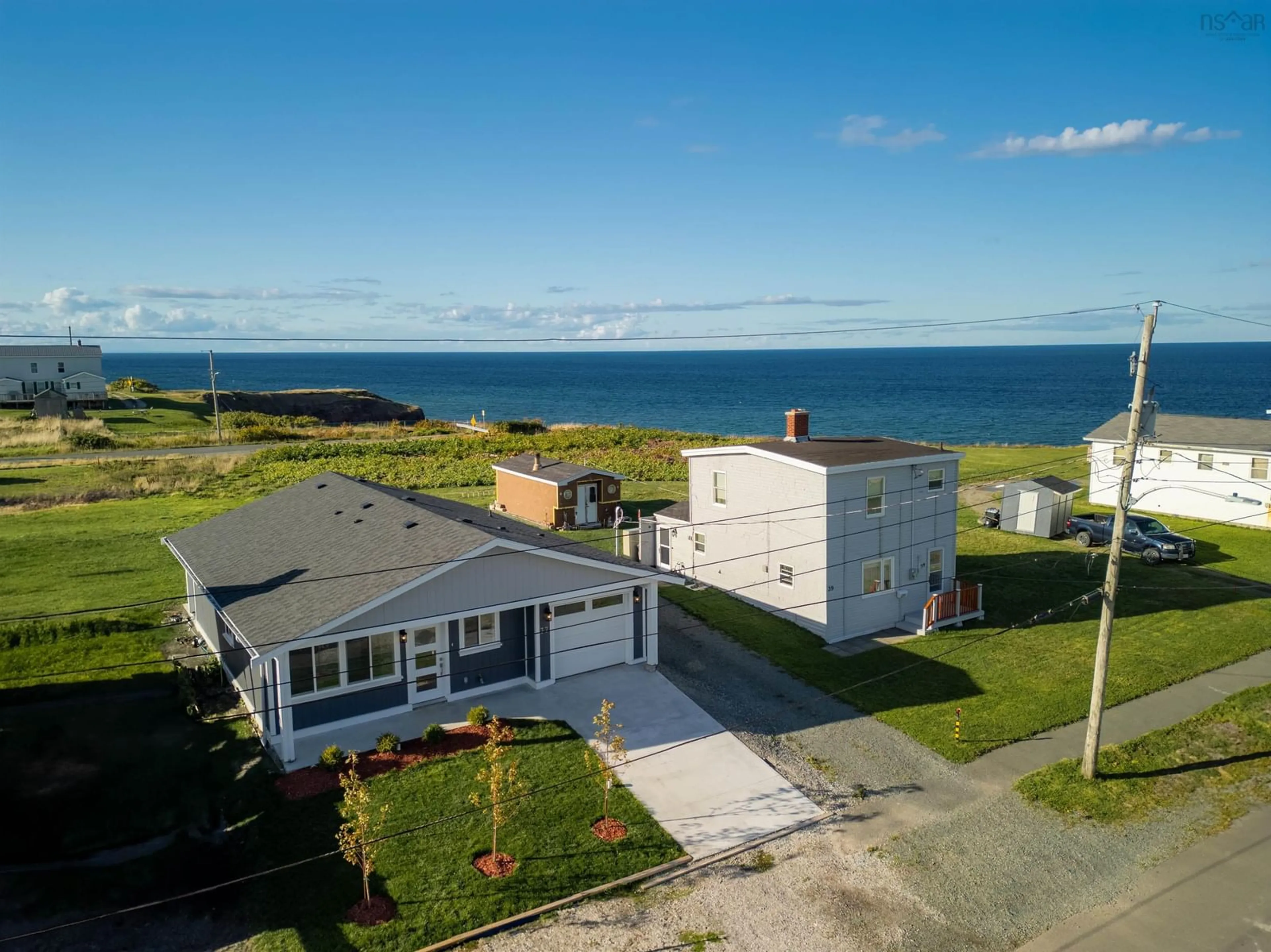 A pic from outside/outdoor area/front of a property/back of a property/a pic from drone, water/lake/river/ocean view for 37 Eighth Street St, Glace Bay Nova Scotia B1A 4K7