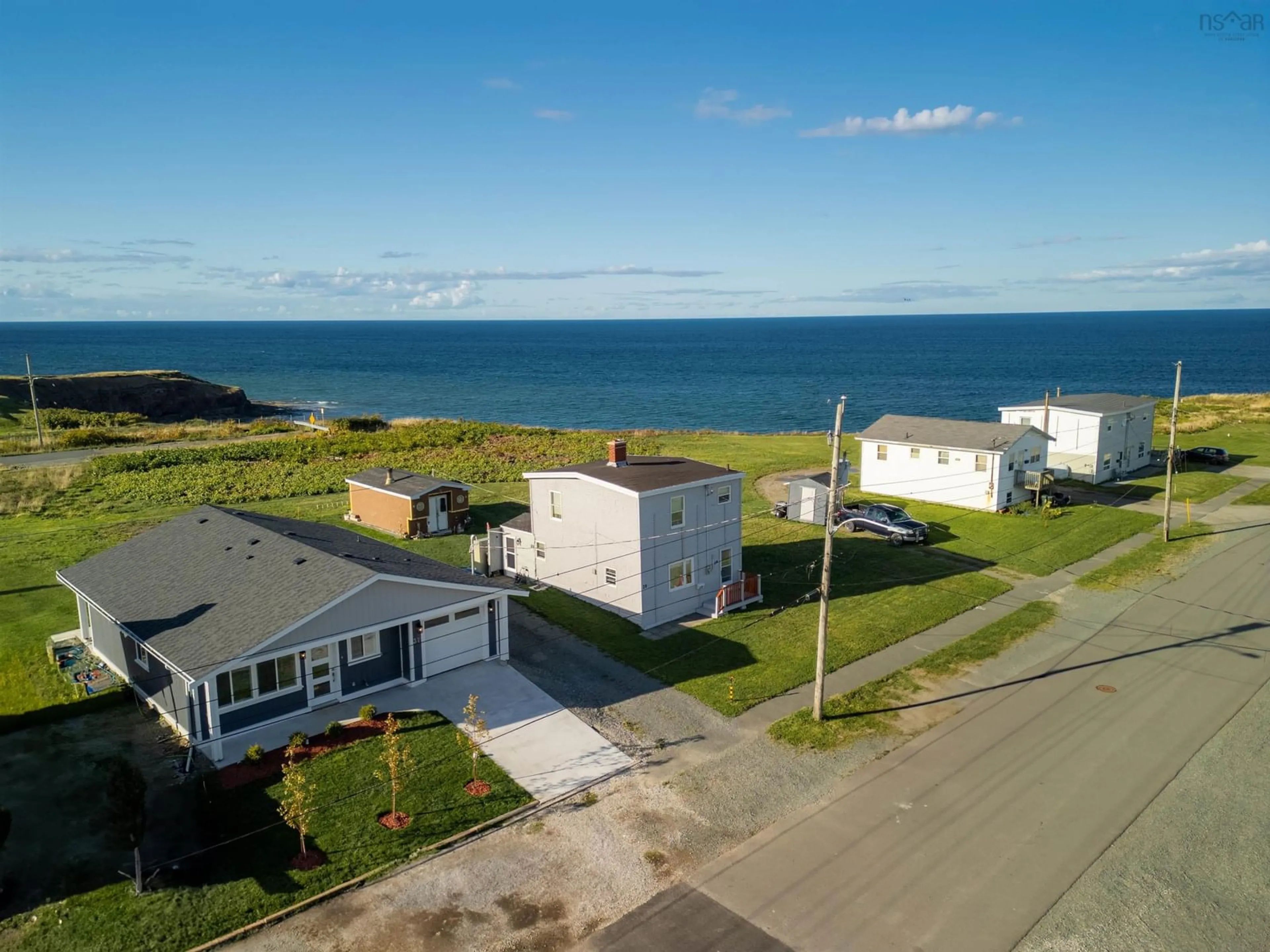 A pic from outside/outdoor area/front of a property/back of a property/a pic from drone, water/lake/river/ocean view for 37 Eighth Street St, Glace Bay Nova Scotia B1A 4K7