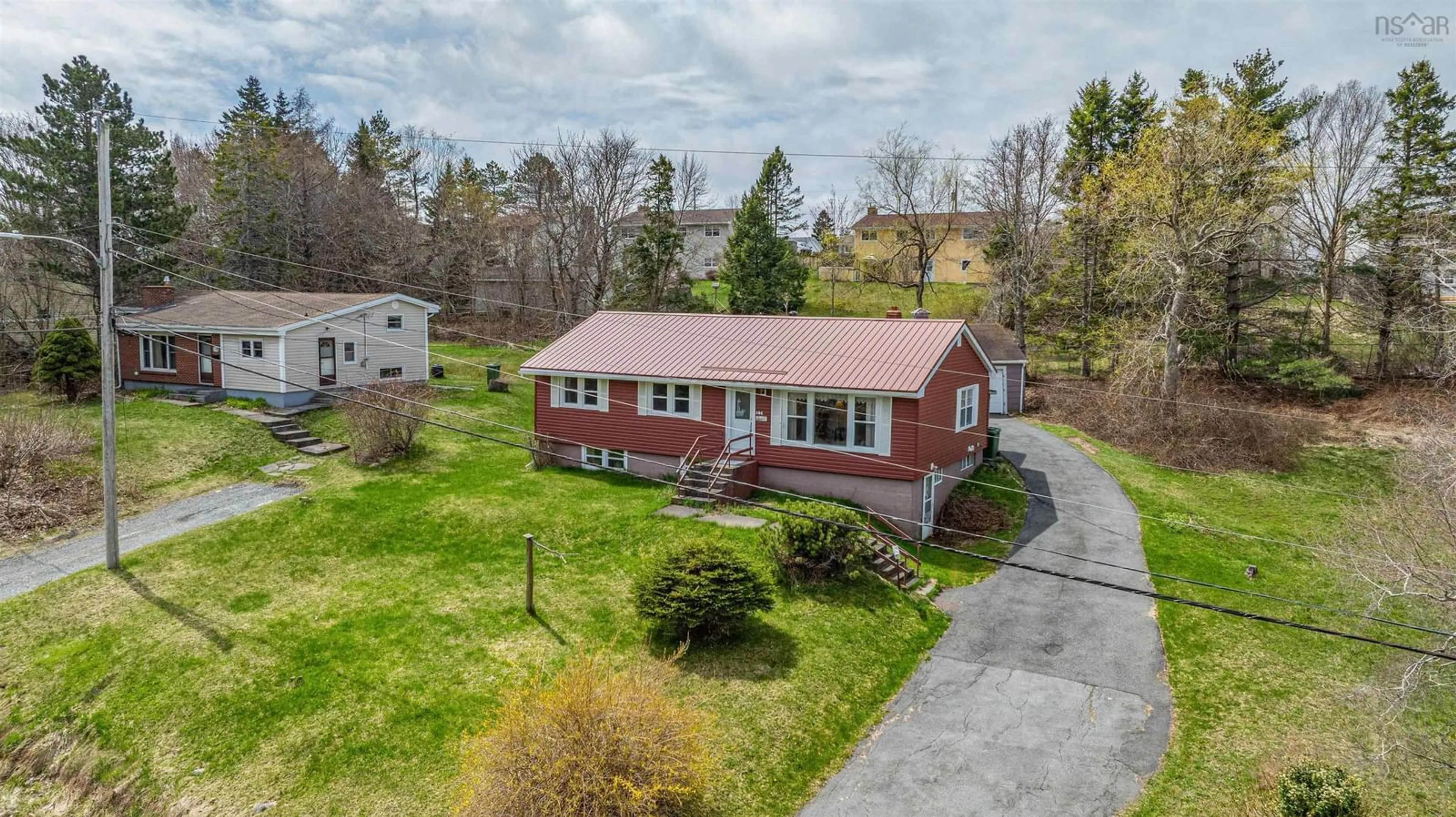 A pic from outside/outdoor area/front of a property/back of a property/a pic from drone, street for 144 Old Beaver Bank Rd, Lower Sackville Nova Scotia B4E 1J3
