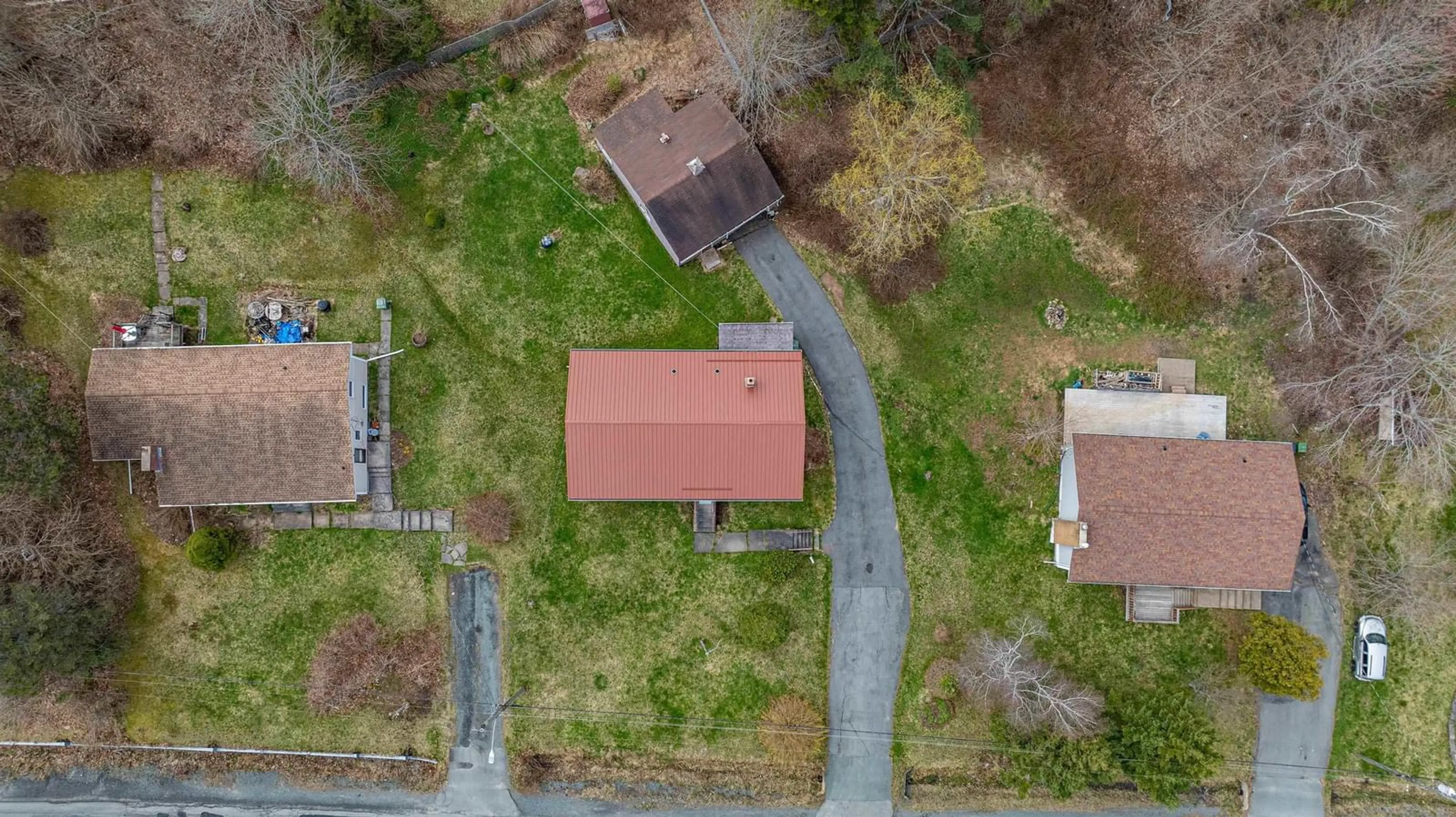 A pic from outside/outdoor area/front of a property/back of a property/a pic from drone, street for 144 Old Beaver Bank Rd, Lower Sackville Nova Scotia B4E 1J3