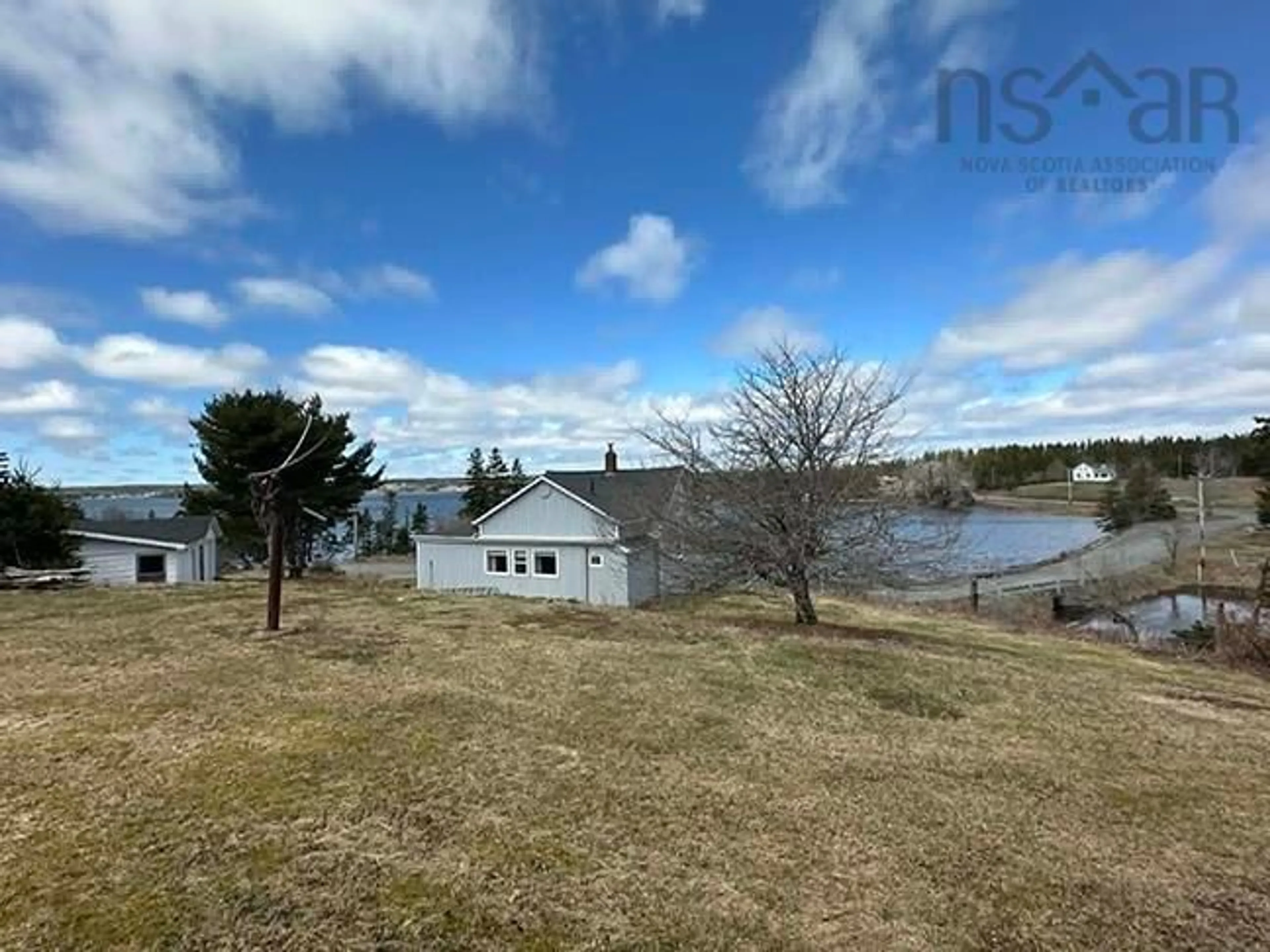 A pic from outside/outdoor area/front of a property/back of a property/a pic from drone, water/lake/river/ocean view for 112 Corbetts Cove Rd, Corbetts Cove Nova Scotia B0E 3B0