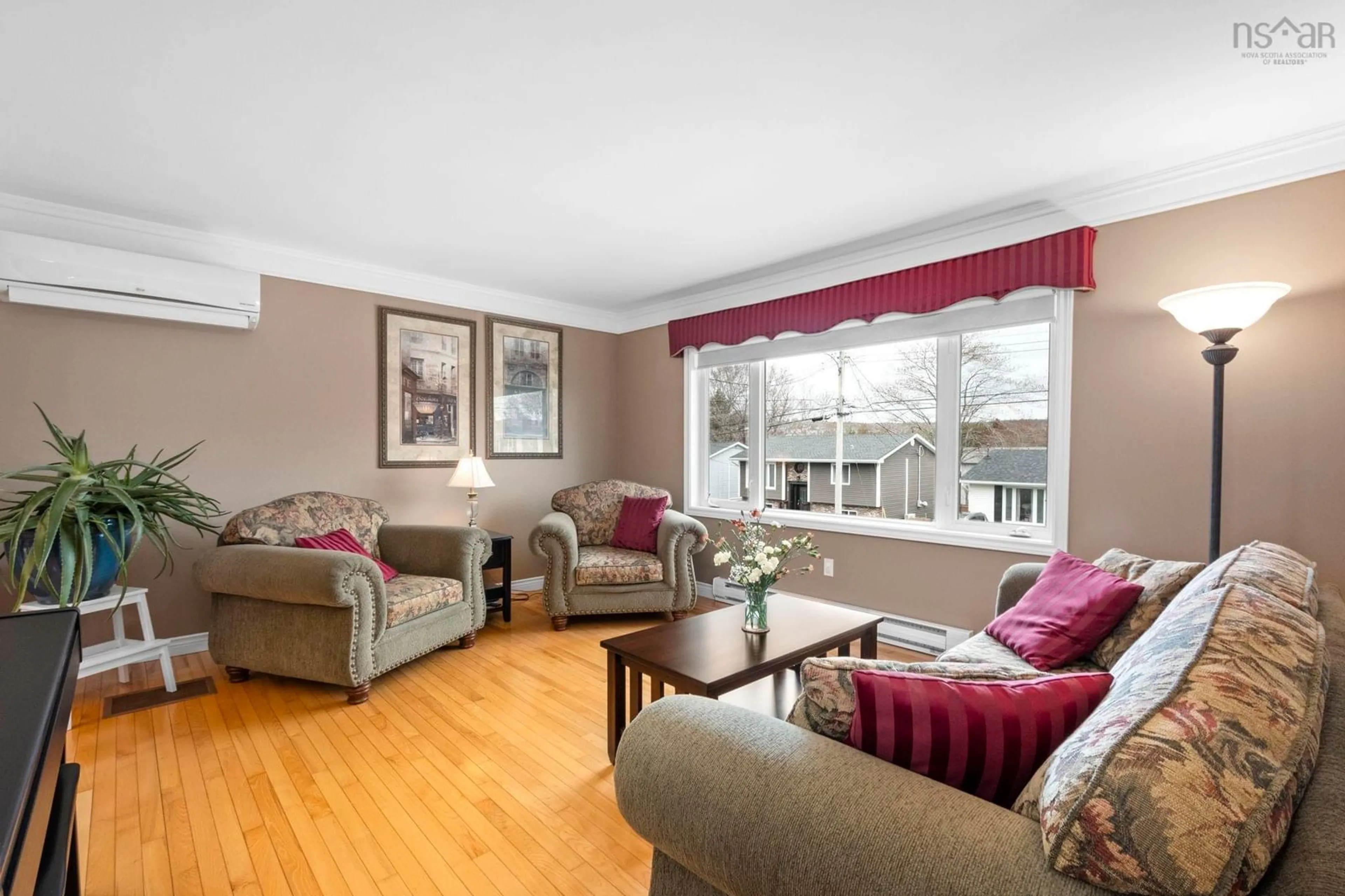 Living room with furniture, wood/laminate floor for 94 Noria Cres, Middle Sackville Nova Scotia B4E 2L4