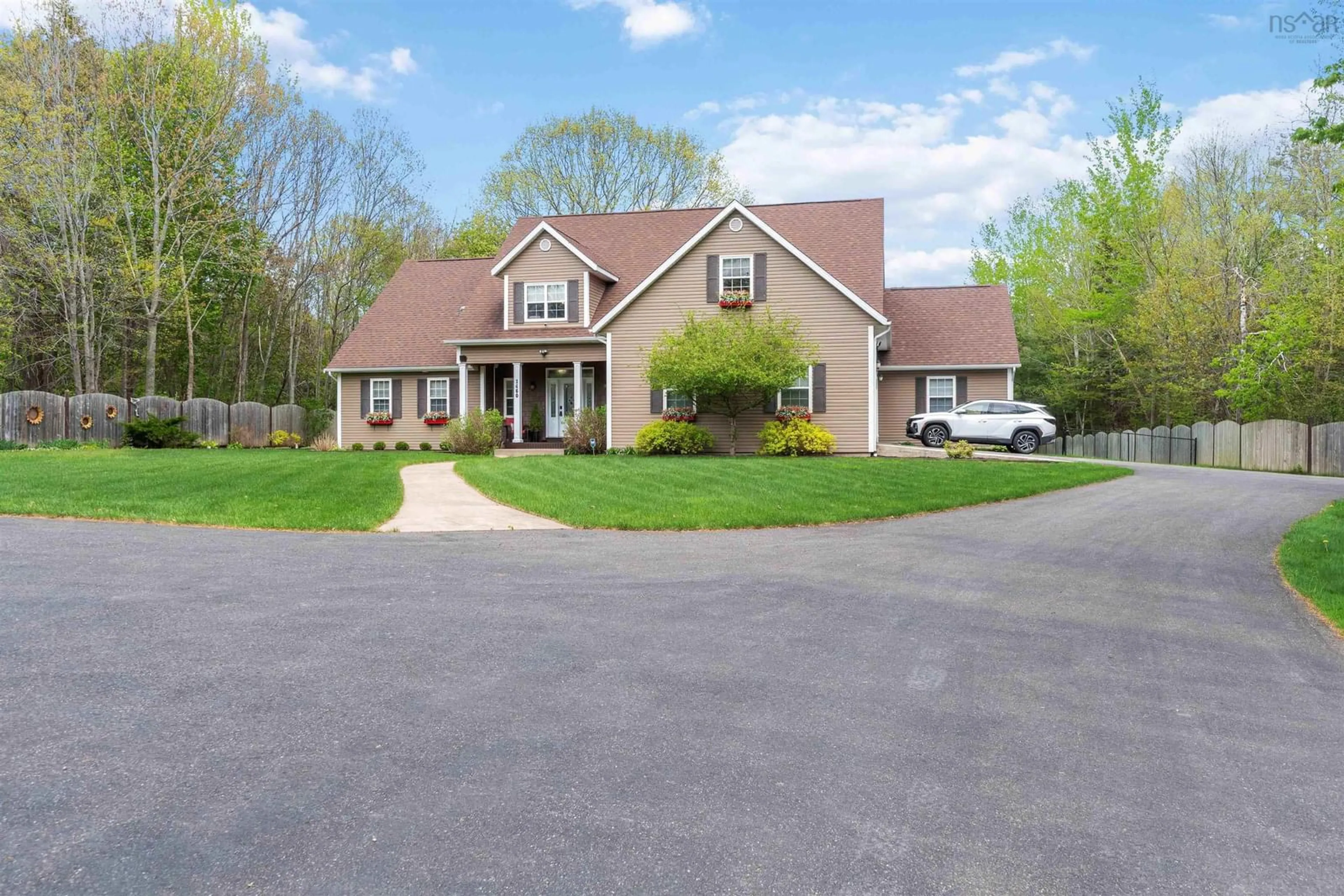Home with vinyl exterior material, street for 1460 Bridge St, Kingston Nova Scotia B0P 1R0