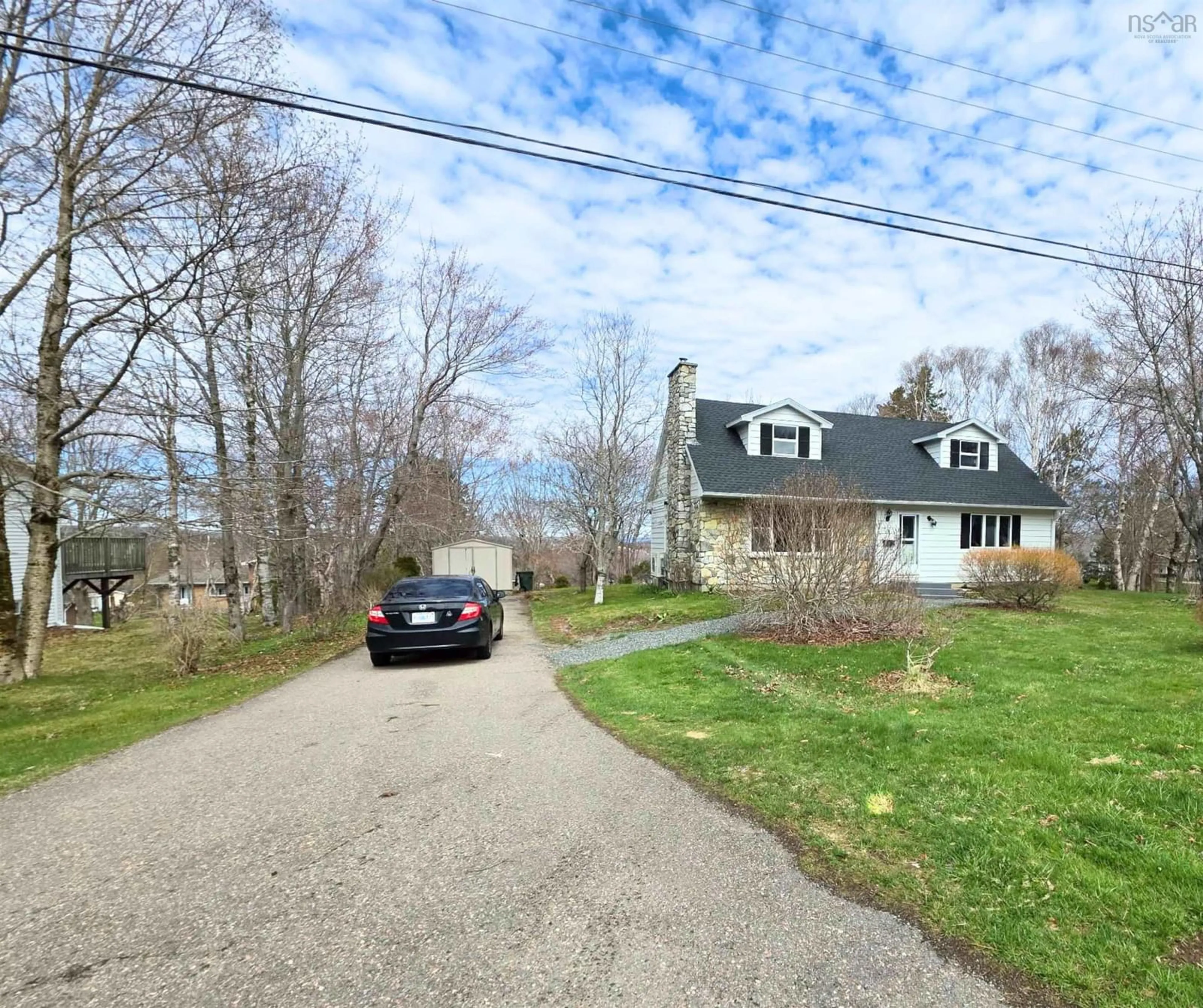A pic from outside/outdoor area/front of a property/back of a property/a pic from drone, street for 70 Glenn Ave, Sydney River Nova Scotia B1S 3B2