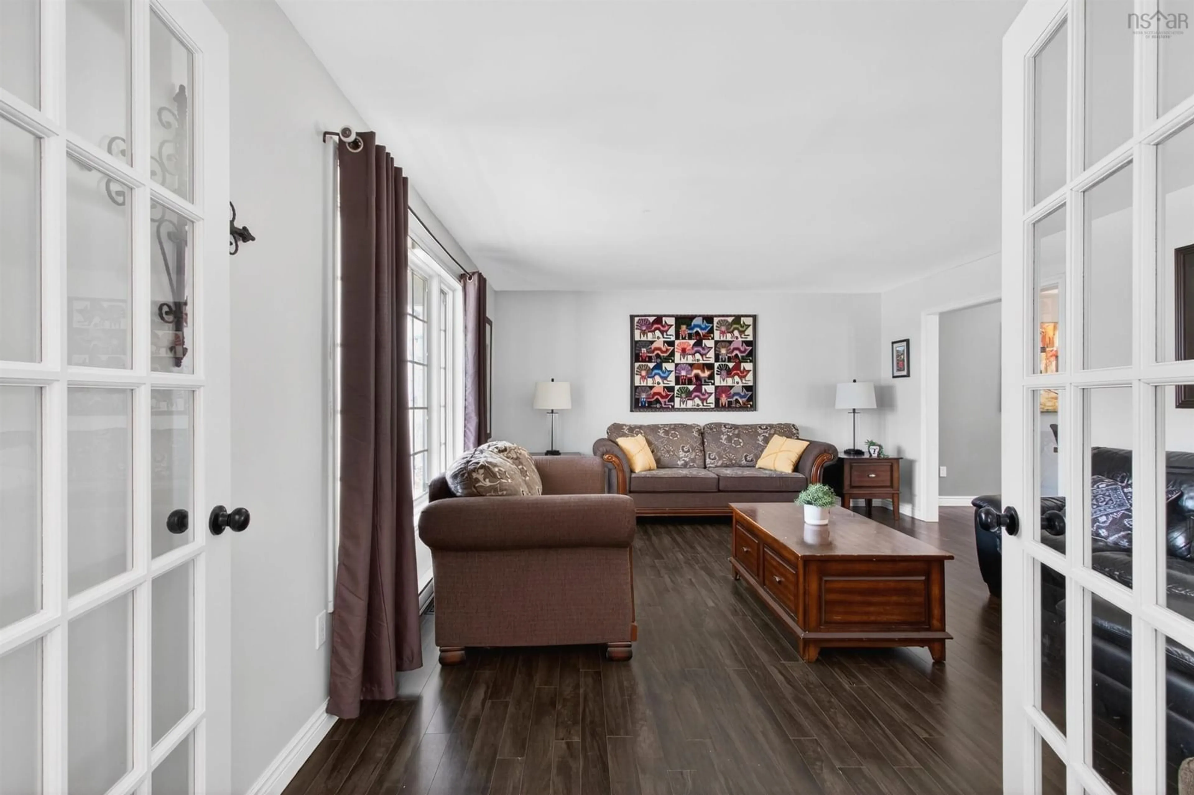 Living room with furniture, wood/laminate floor for 8 Pinewood Dr, Lakelands Nova Scotia B0N 1Z0