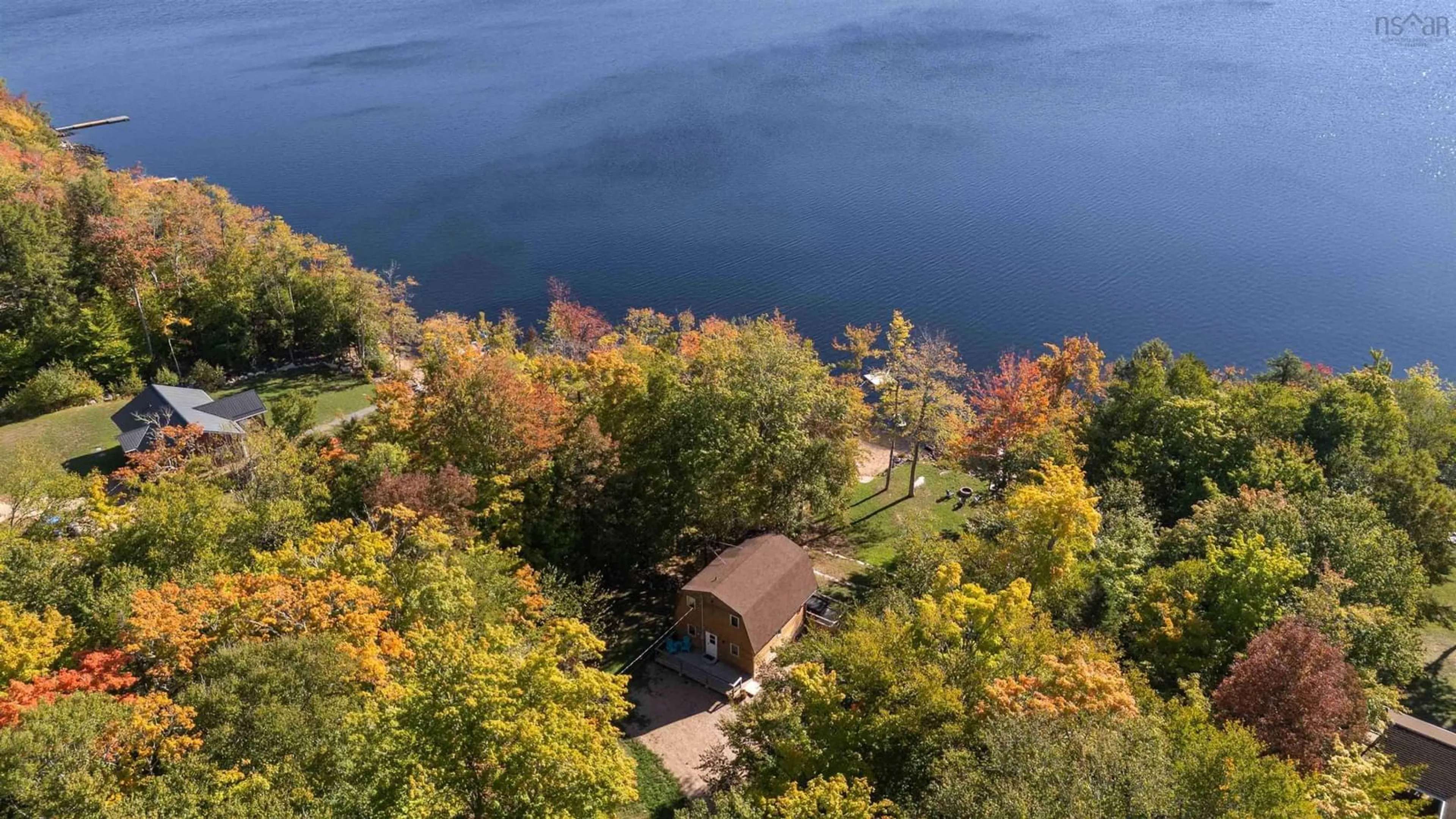 A pic from outside/outdoor area/front of a property/back of a property/a pic from drone, water/lake/river/ocean view for 232 Lakeside Dr, East Dalhousie Nova Scotia B0R 1H0