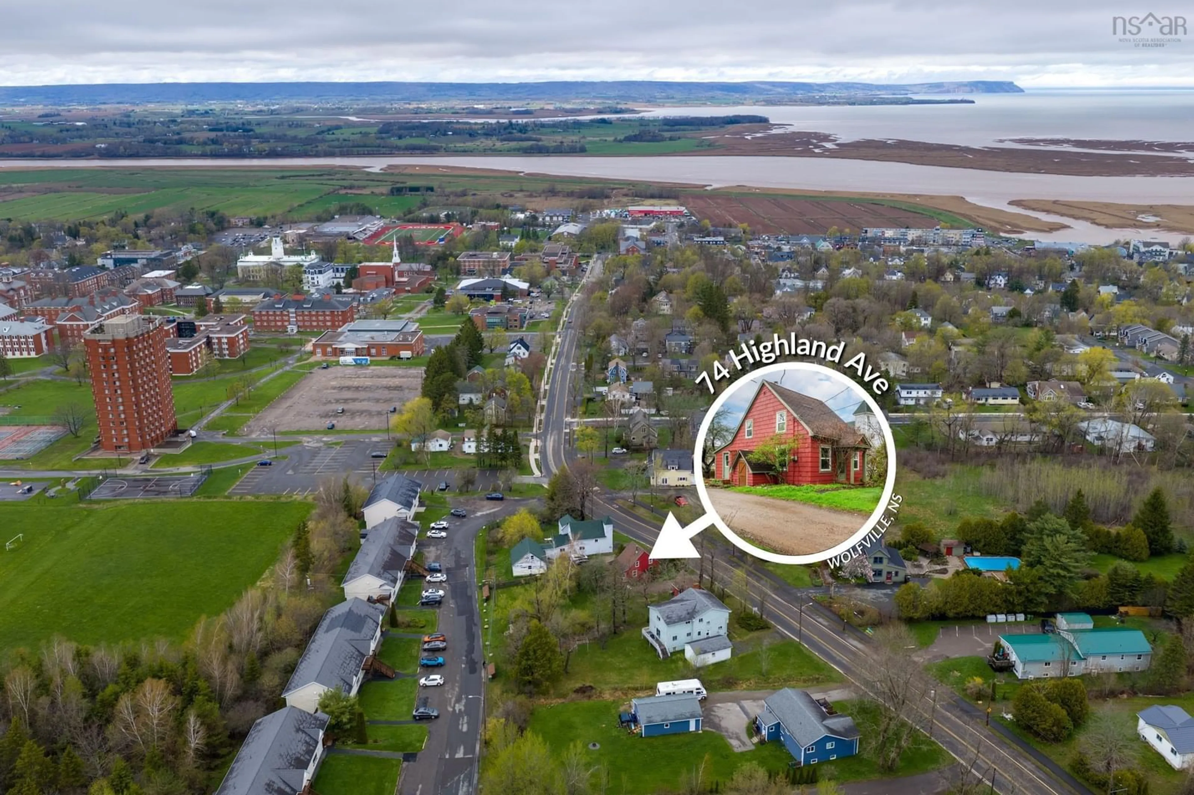 A pic from outside/outdoor area/front of a property/back of a property/a pic from drone, water/lake/river/ocean view for 74 Highland Ave, Wolfville Nova Scotia B4P 1Z6