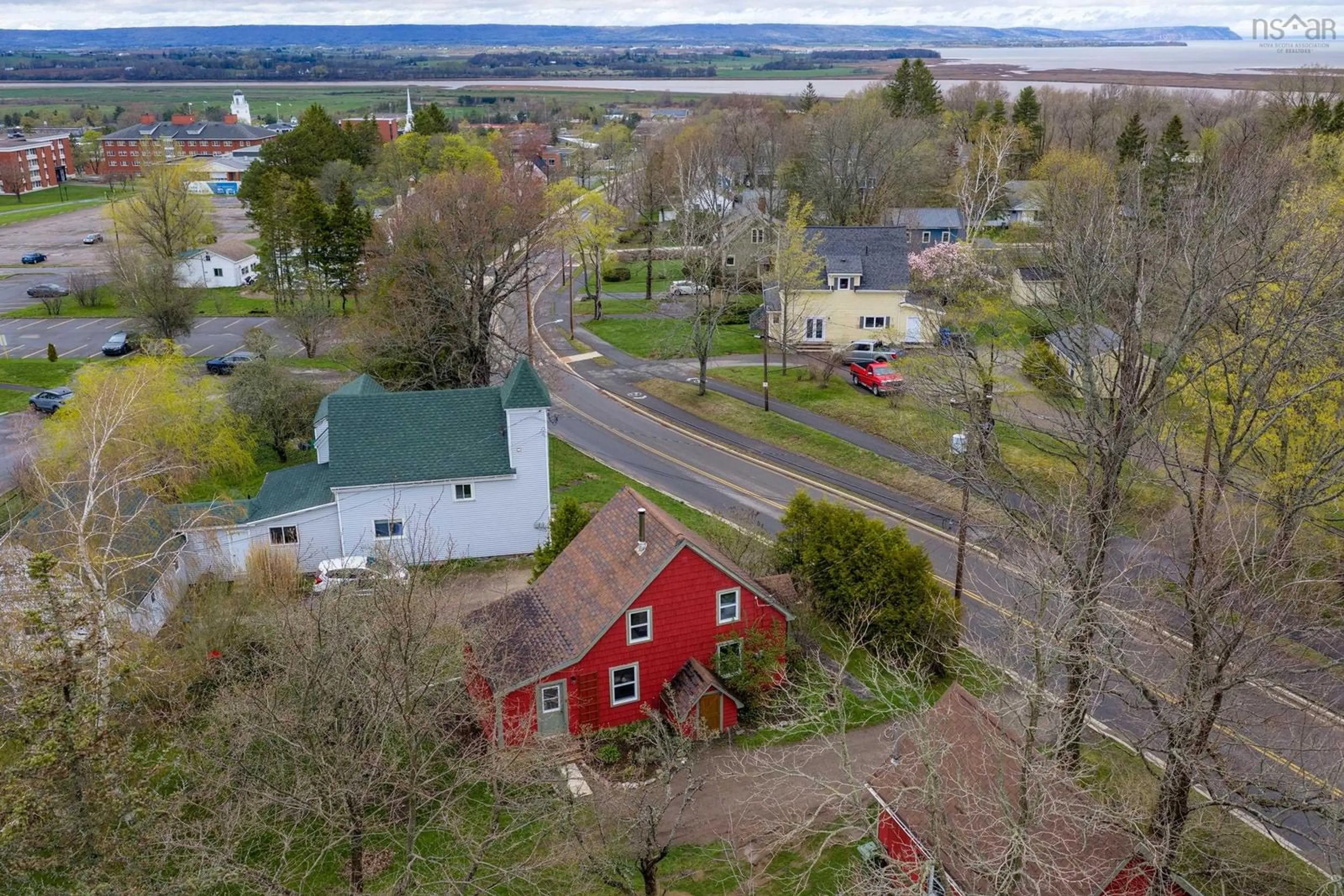 A pic from outside/outdoor area/front of a property/back of a property/a pic from drone, unknown for 74 Highland Ave, Wolfville Nova Scotia B4P 1Z6