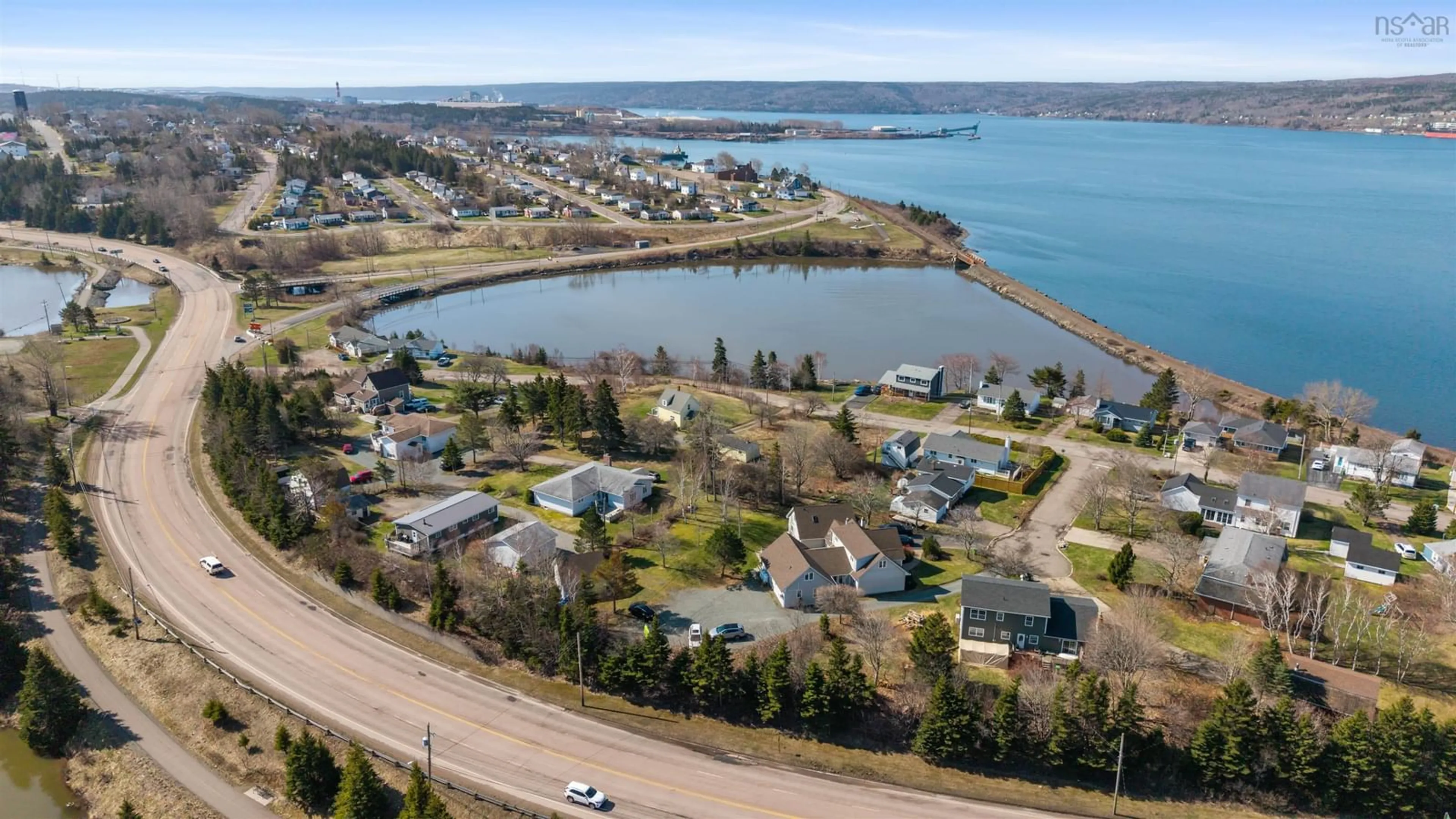 A pic from outside/outdoor area/front of a property/back of a property/a pic from drone, water/lake/river/ocean view for Tupper Crt #4, Port Hawkesbury Nova Scotia B9A 2A6