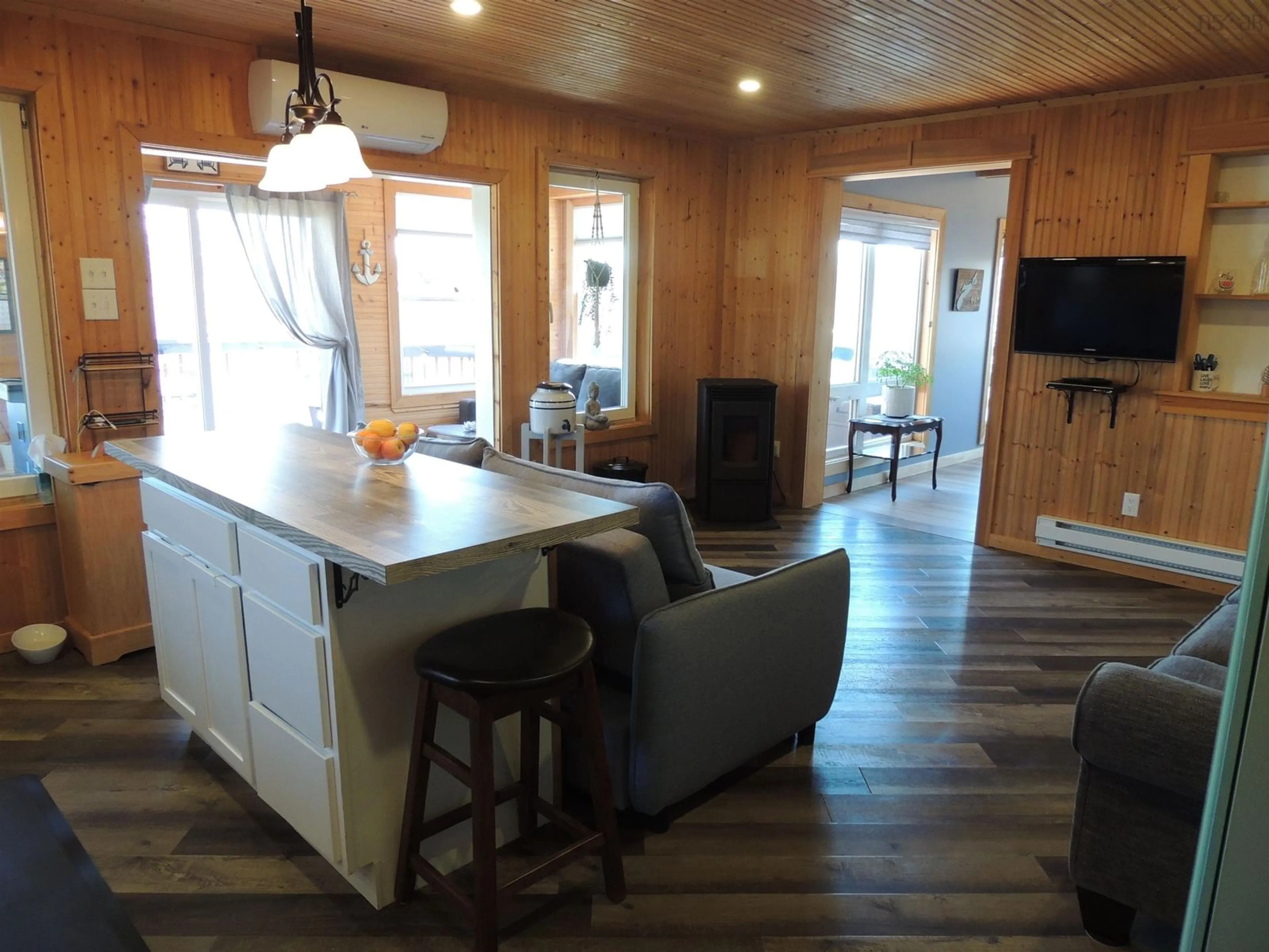 Open concept kitchen, wood/laminate floor for 24 Pirates Cove Way, River John Nova Scotia B0K 1N0