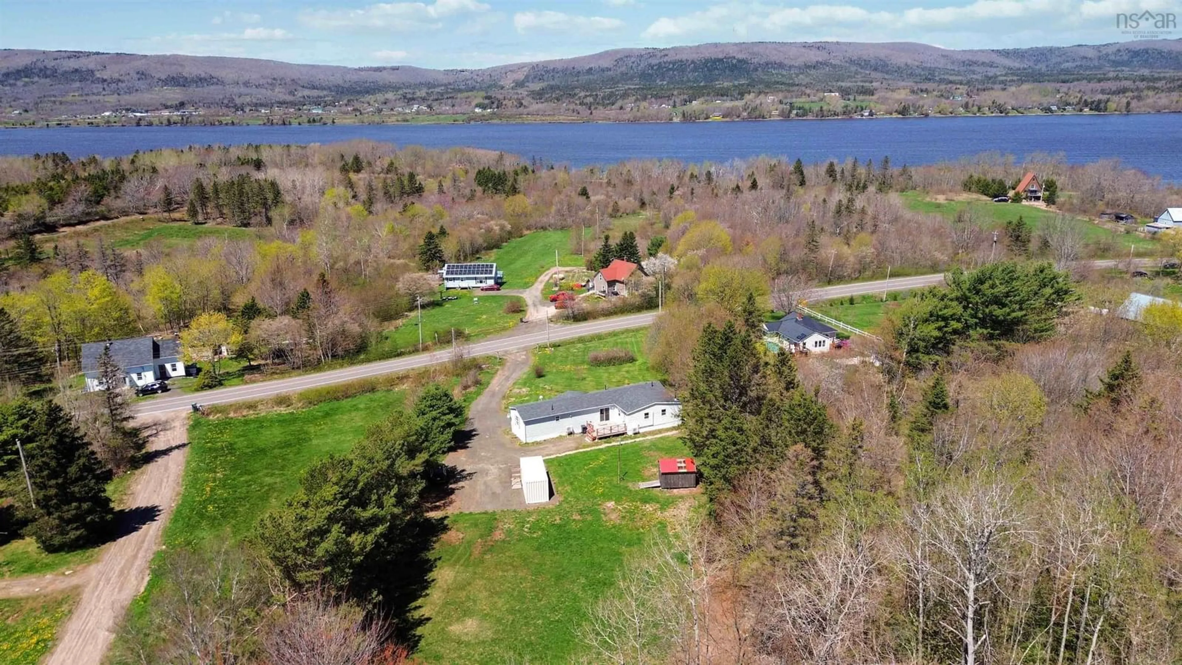 A pic from outside/outdoor area/front of a property/back of a property/a pic from drone, water/lake/river/ocean view for 538 Highway 201 Hwy, Moschelle Nova Scotia B0S 1A0