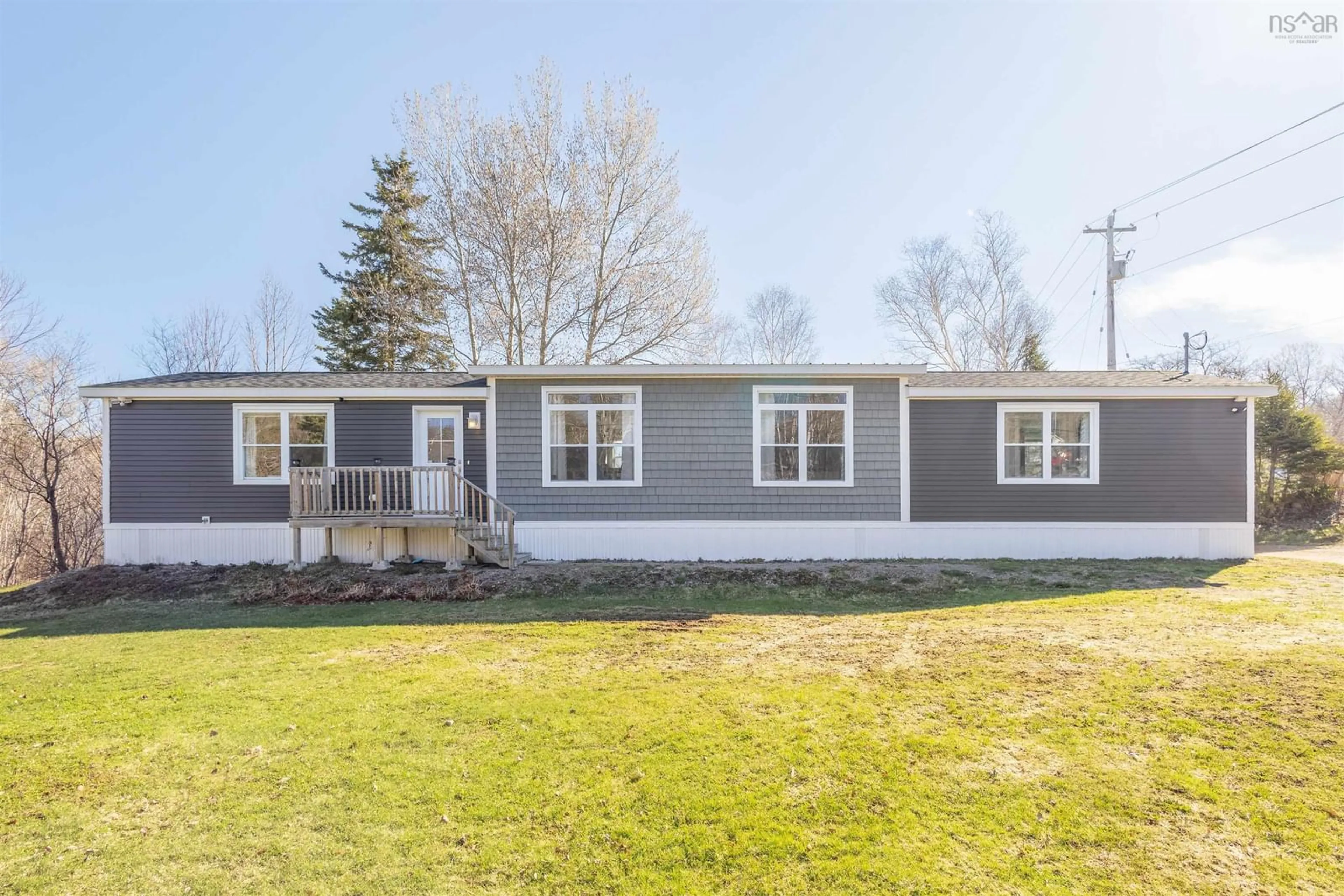 Home with vinyl exterior material, street for 4 Kelly's Lane, Ingonish Beach Nova Scotia B0C 1L0