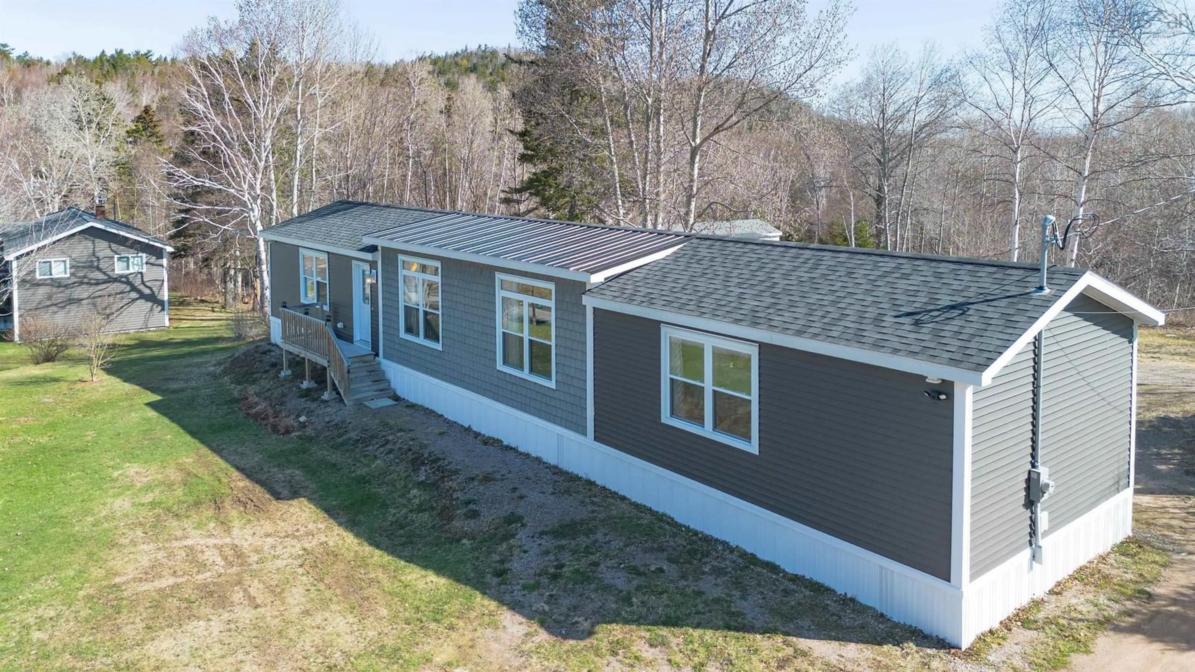 Home with vinyl exterior material, building for 4 Kelly's Lane, Ingonish Beach Nova Scotia B0C 1L0