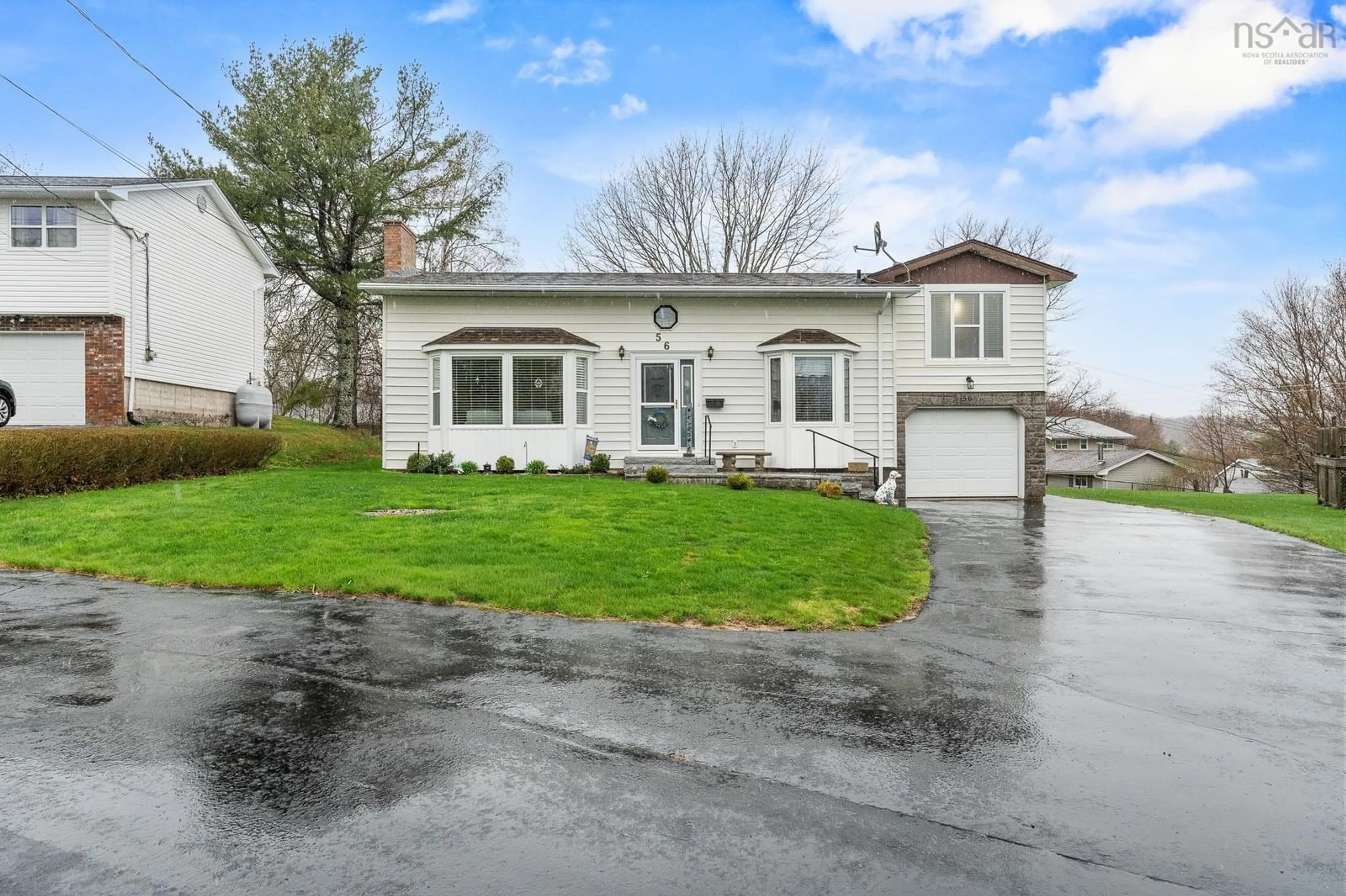 Home with vinyl exterior material, street for 56 Raymond Dr, Lower Sackville Nova Scotia B4C 1H2