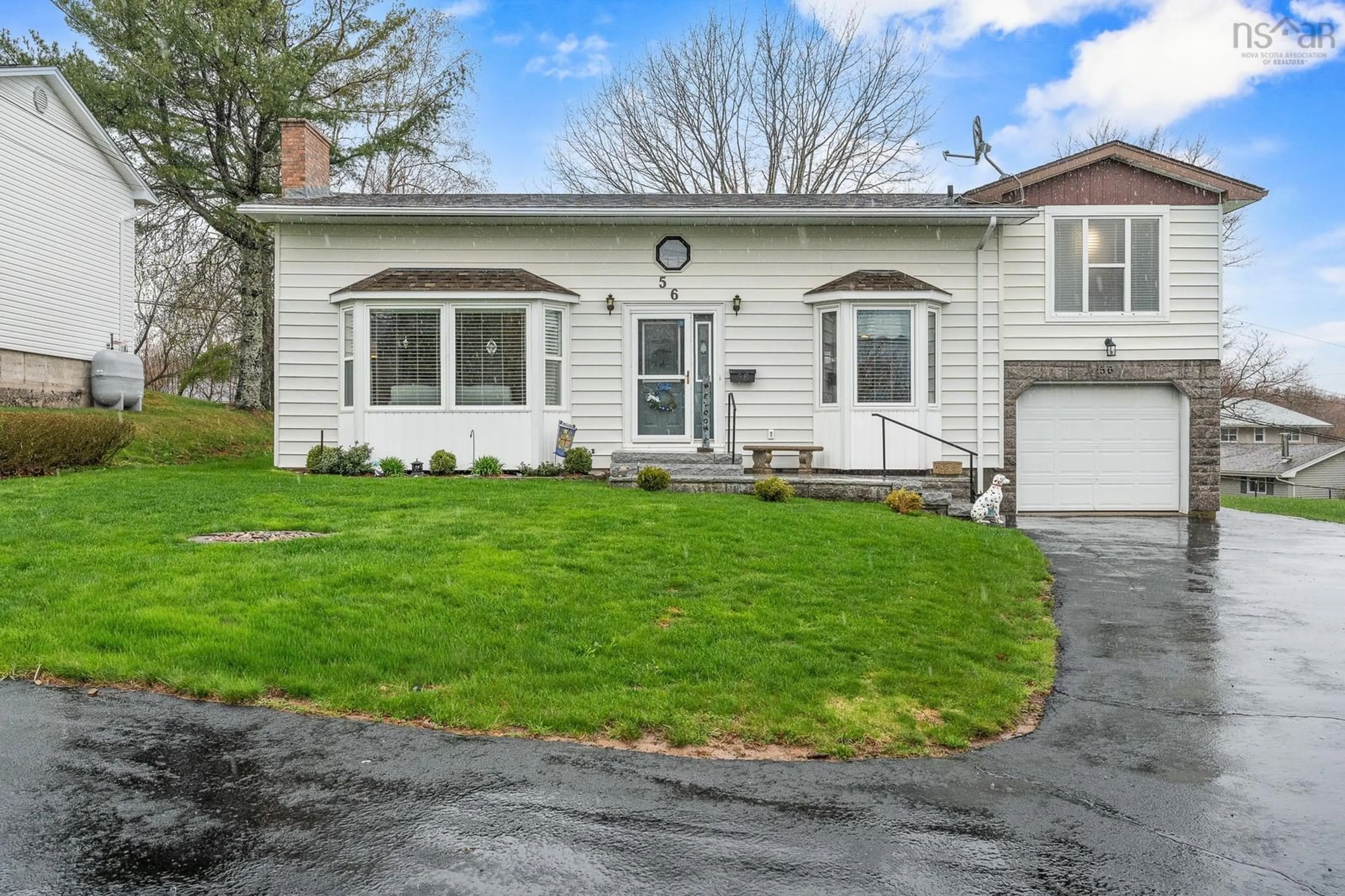 Home with vinyl exterior material, street for 56 Raymond Dr, Lower Sackville Nova Scotia B4C 1H2