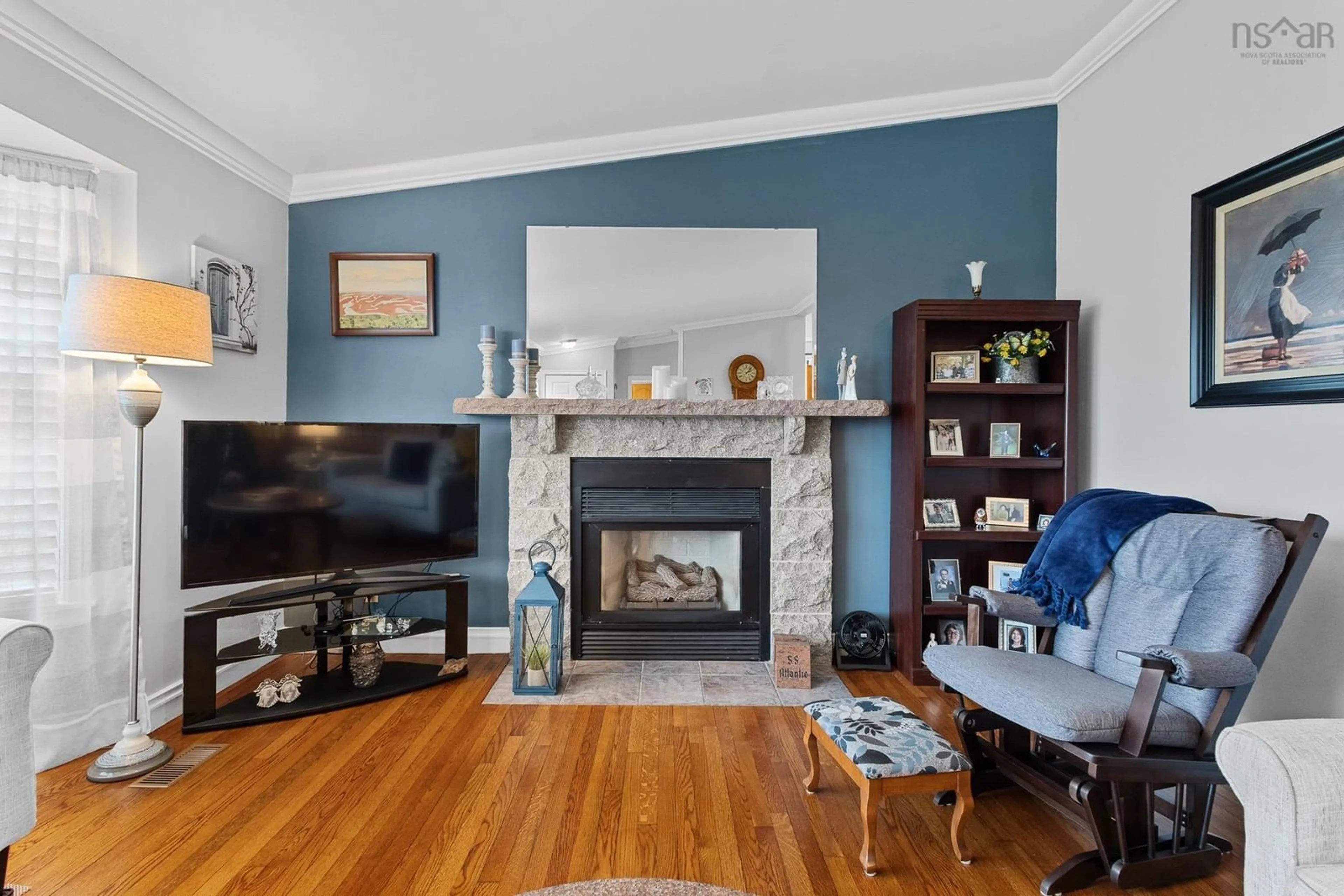 Living room with furniture, wood/laminate floor for 56 Raymond Dr, Lower Sackville Nova Scotia B4C 1H2