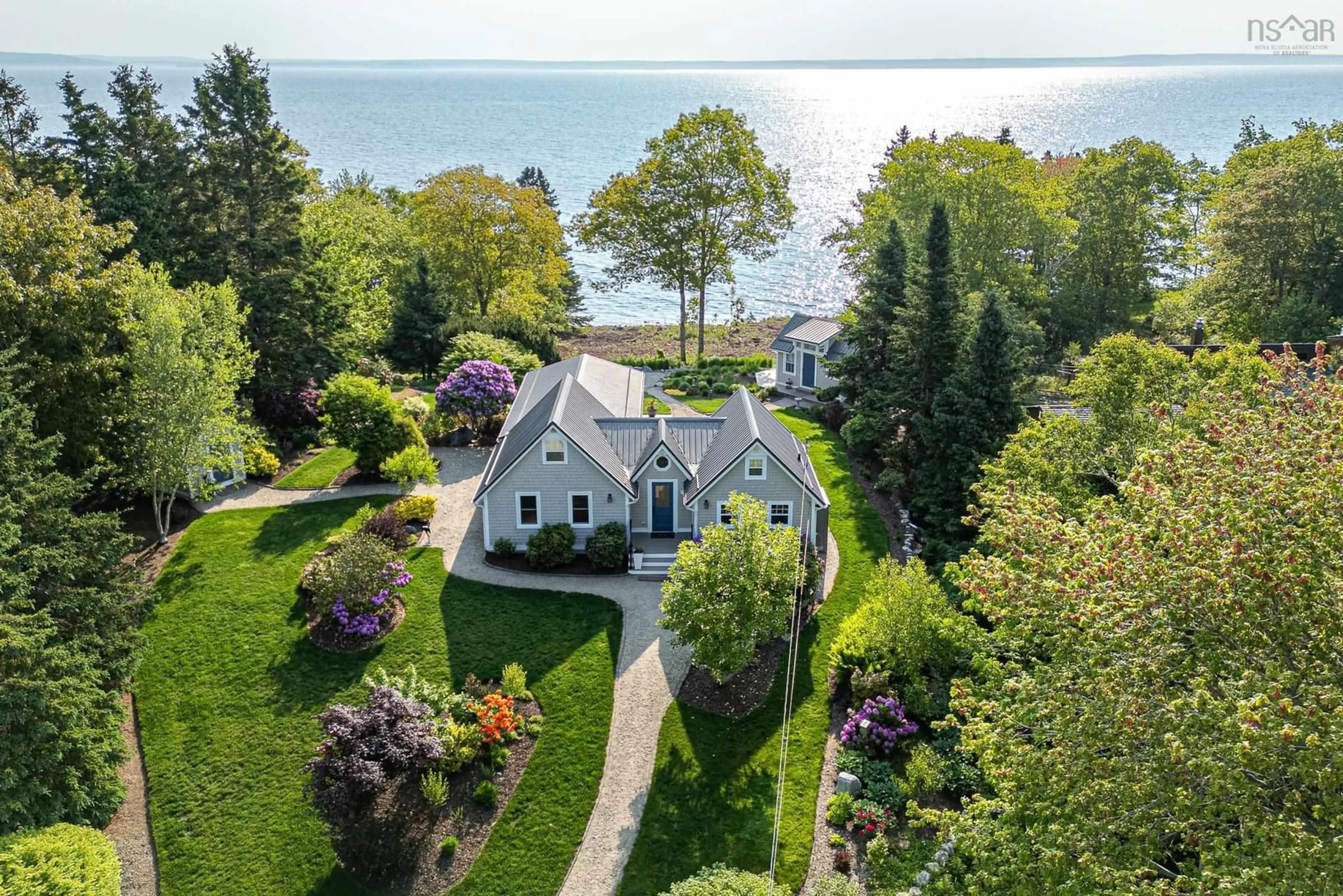 A pic from outside/outdoor area/front of a property/back of a property/a pic from drone, water/lake/river/ocean view for 17 Mill Cove Shore Rd, Mill Cove Nova Scotia B0J 1T0