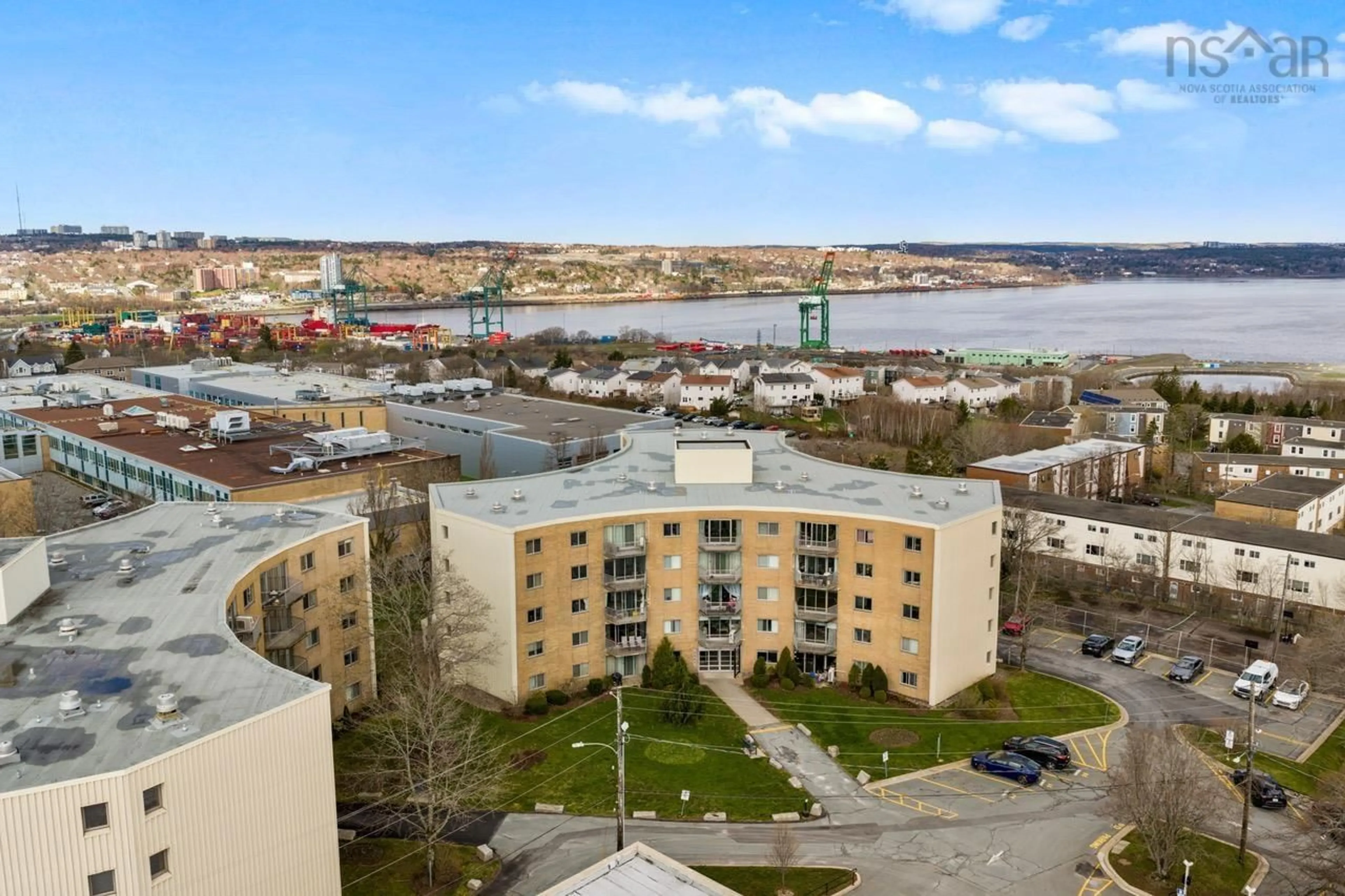 A pic from outside/outdoor area/front of a property/back of a property/a pic from drone, water/lake/river/ocean view for 5561 Heatherwood Crt #205, Halifax Nova Scotia B3K 5N7