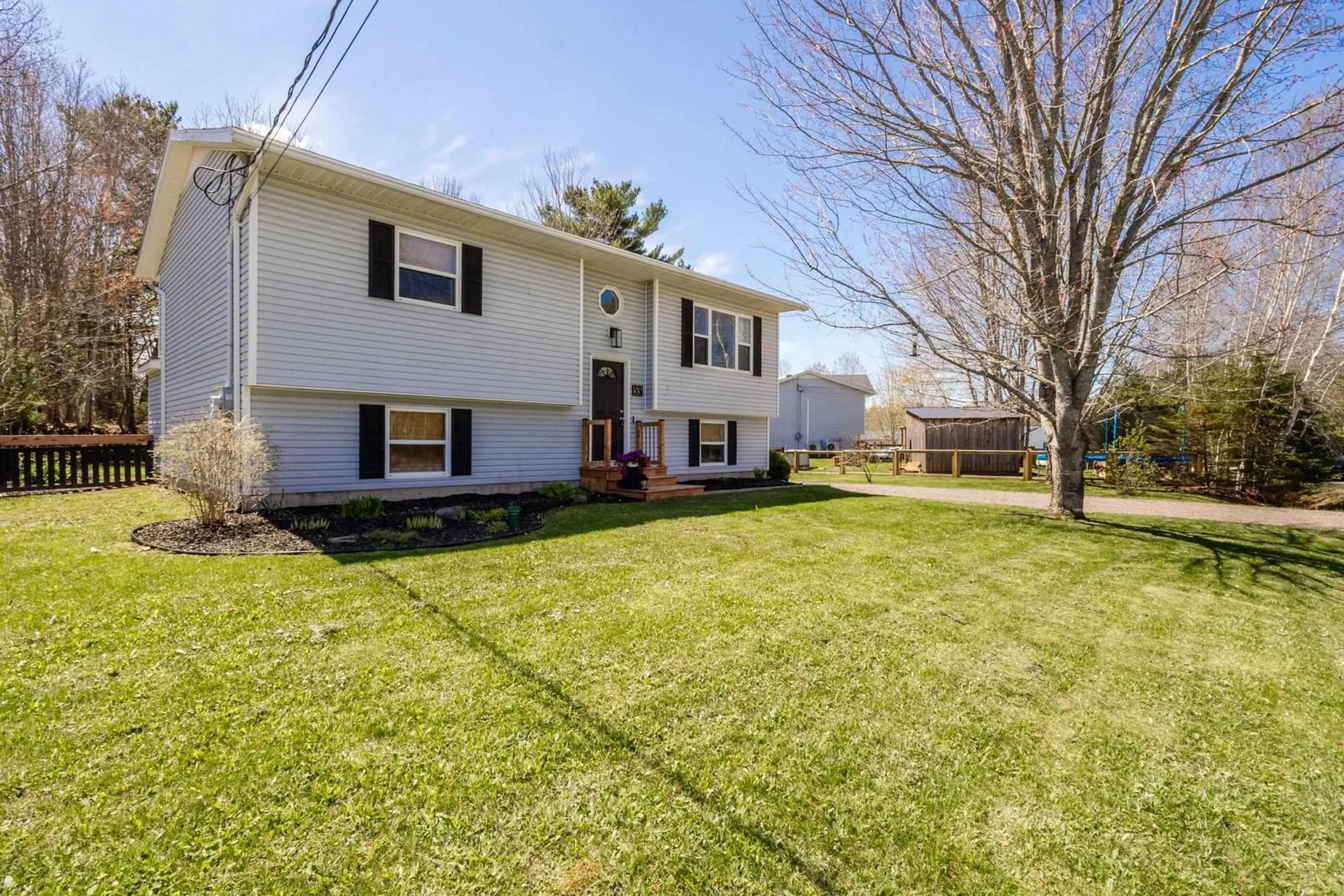 Home with vinyl exterior material, street for 53 Sunset Dr, Kingston Nova Scotia B0P 1R0