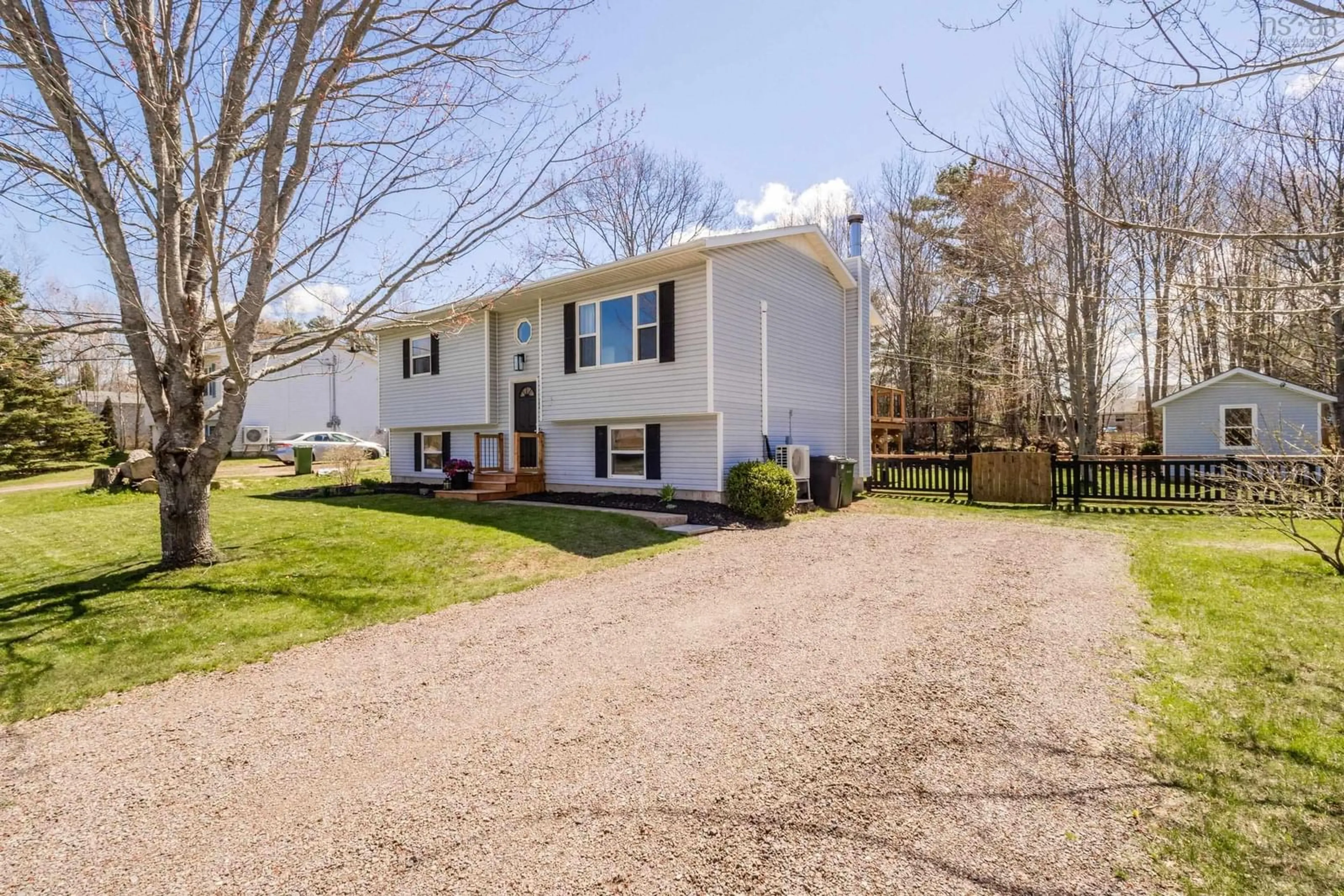 Home with vinyl exterior material, street for 53 Sunset Dr, Kingston Nova Scotia B0P 1R0