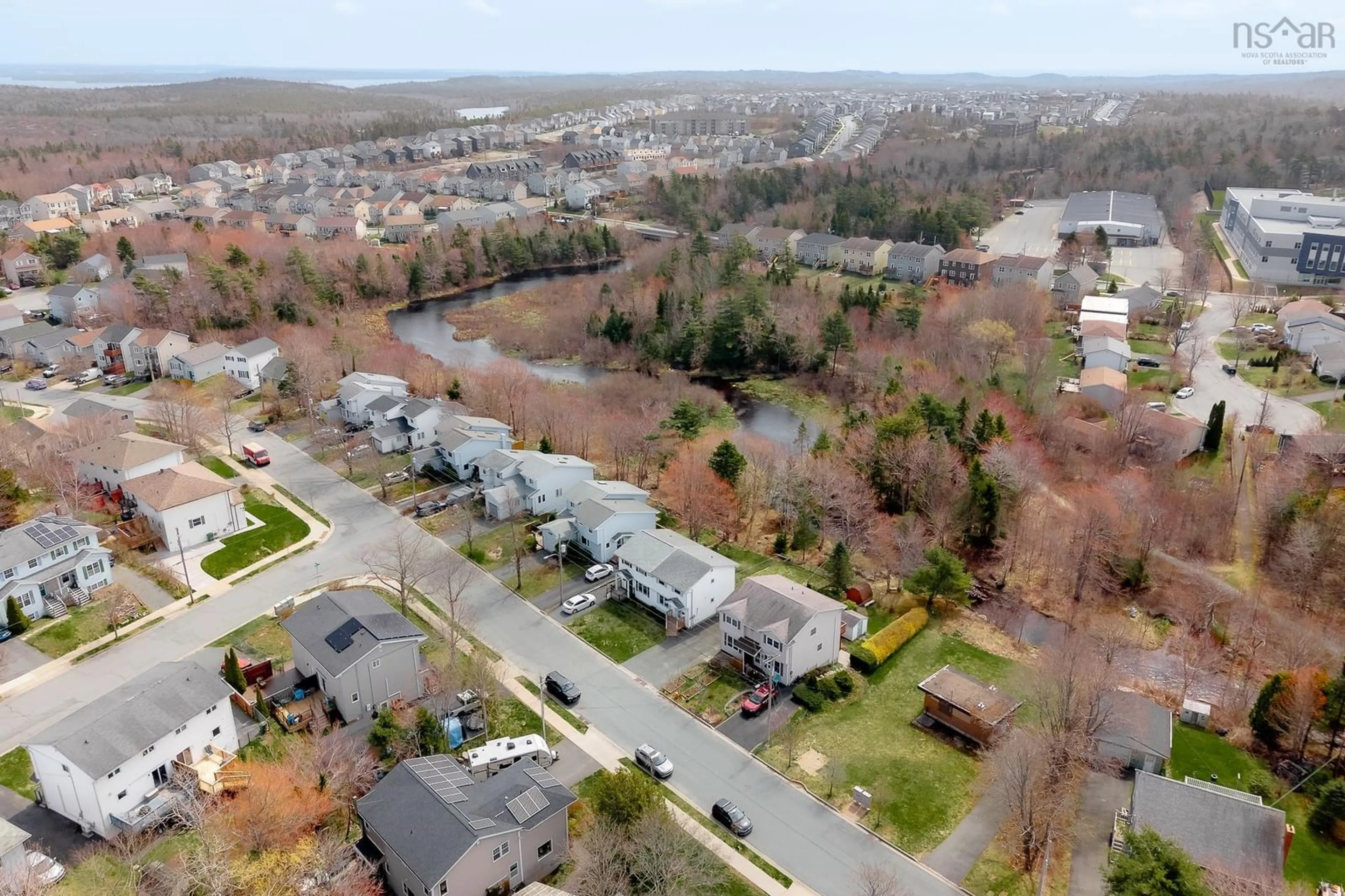 A pic from outside/outdoor area/front of a property/back of a property/a pic from drone, water/lake/river/ocean view for 15 Theakston Ave, Spryfield Nova Scotia B3R 1R7
