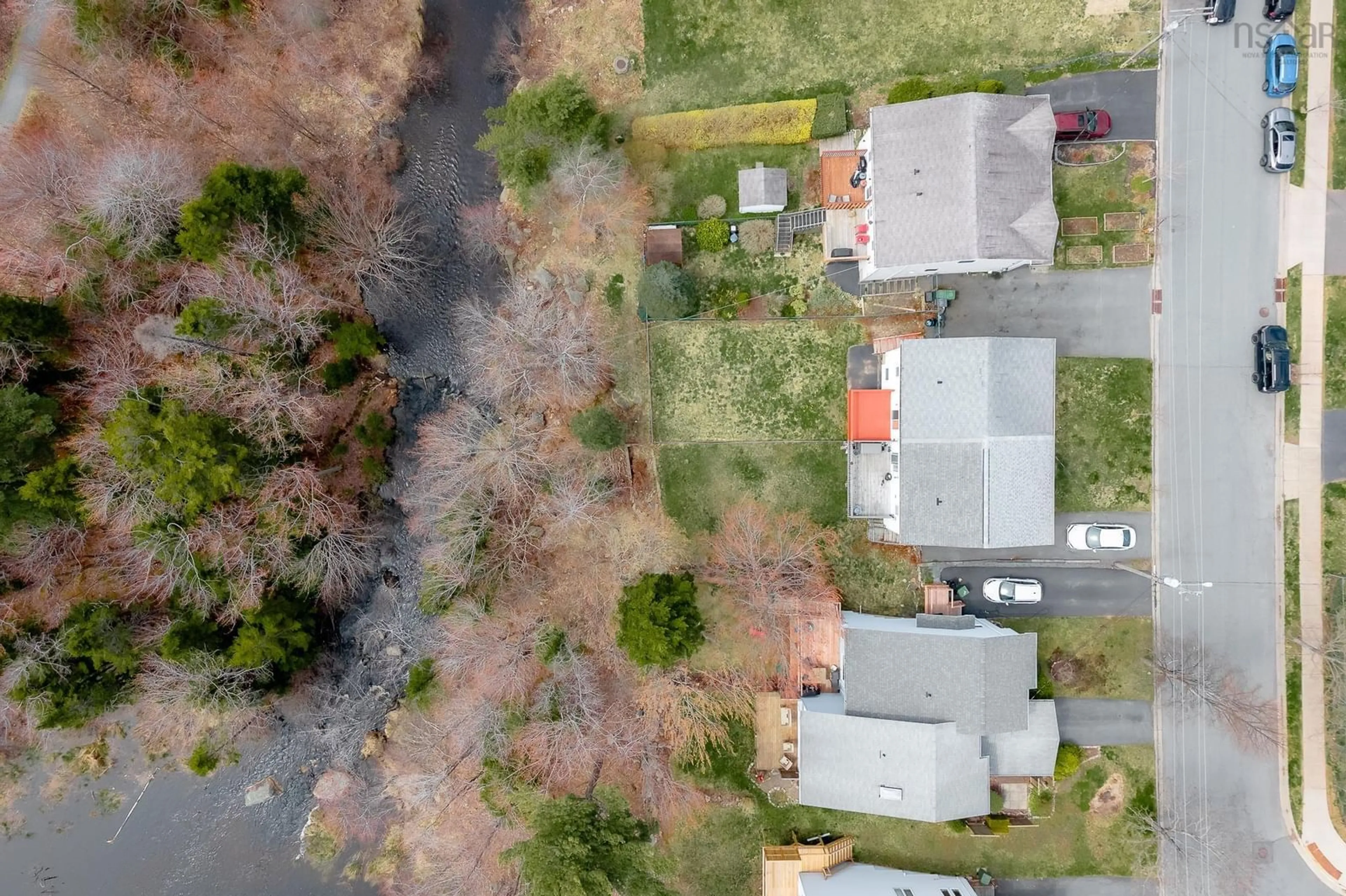 A pic from outside/outdoor area/front of a property/back of a property/a pic from drone, street for 15 Theakston Ave, Spryfield Nova Scotia B3R 1R7