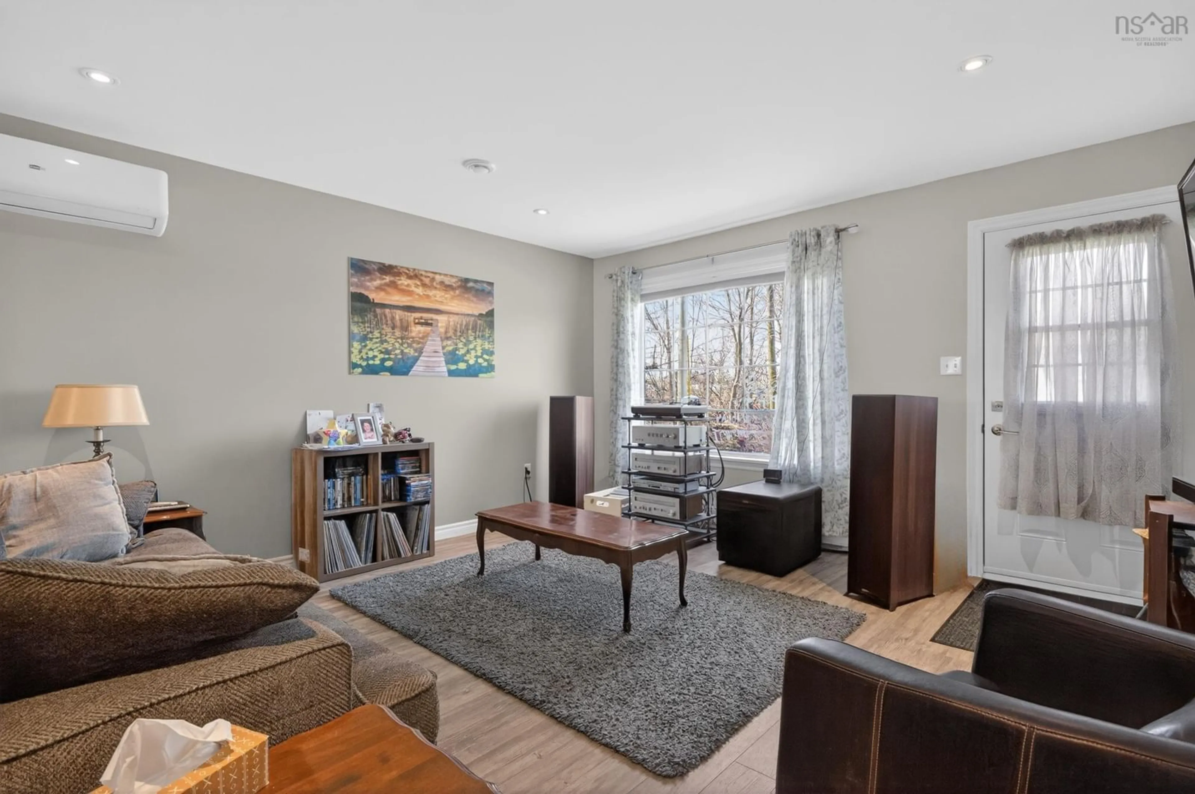 Living room with furniture, wood/laminate floor for 17 Moore St, Truro Nova Scotia B2N 4N8
