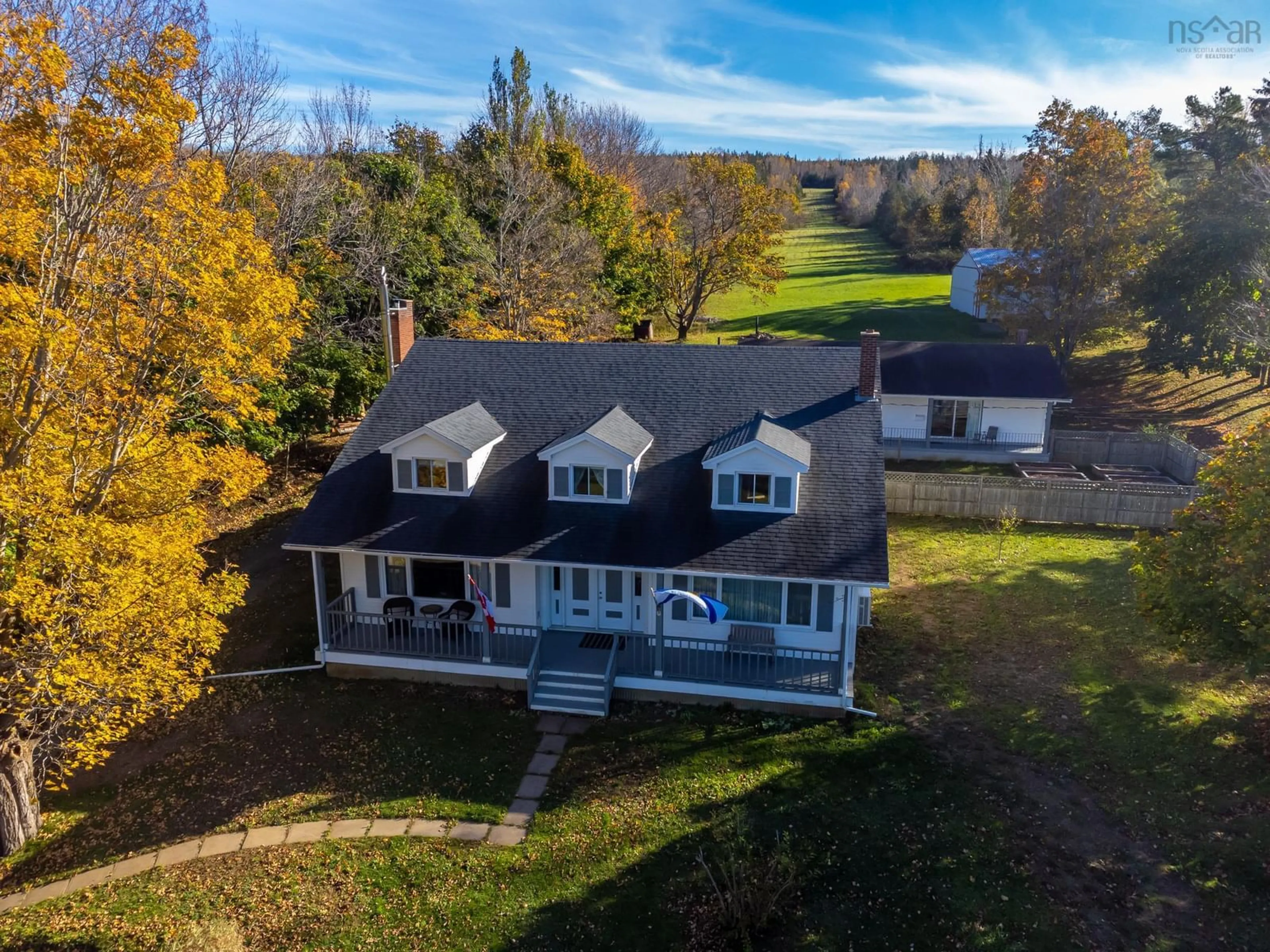 A pic from outside/outdoor area/front of a property/back of a property/a pic from drone, water/lake/river/ocean view for 428 Highway 1, Deep Brook Nova Scotia B0S 1J0