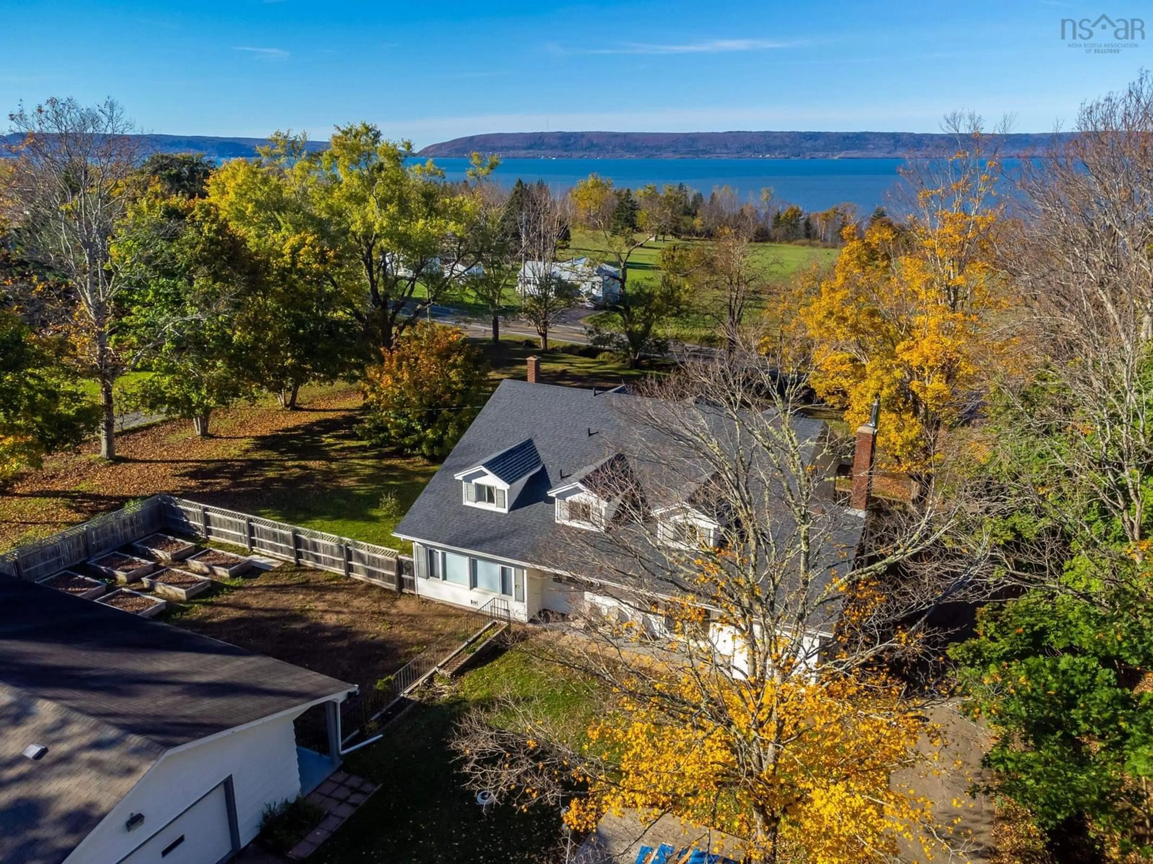 A pic from outside/outdoor area/front of a property/back of a property/a pic from drone, water/lake/river/ocean view for 428 Highway 1, Deep Brook Nova Scotia B0S 1J0