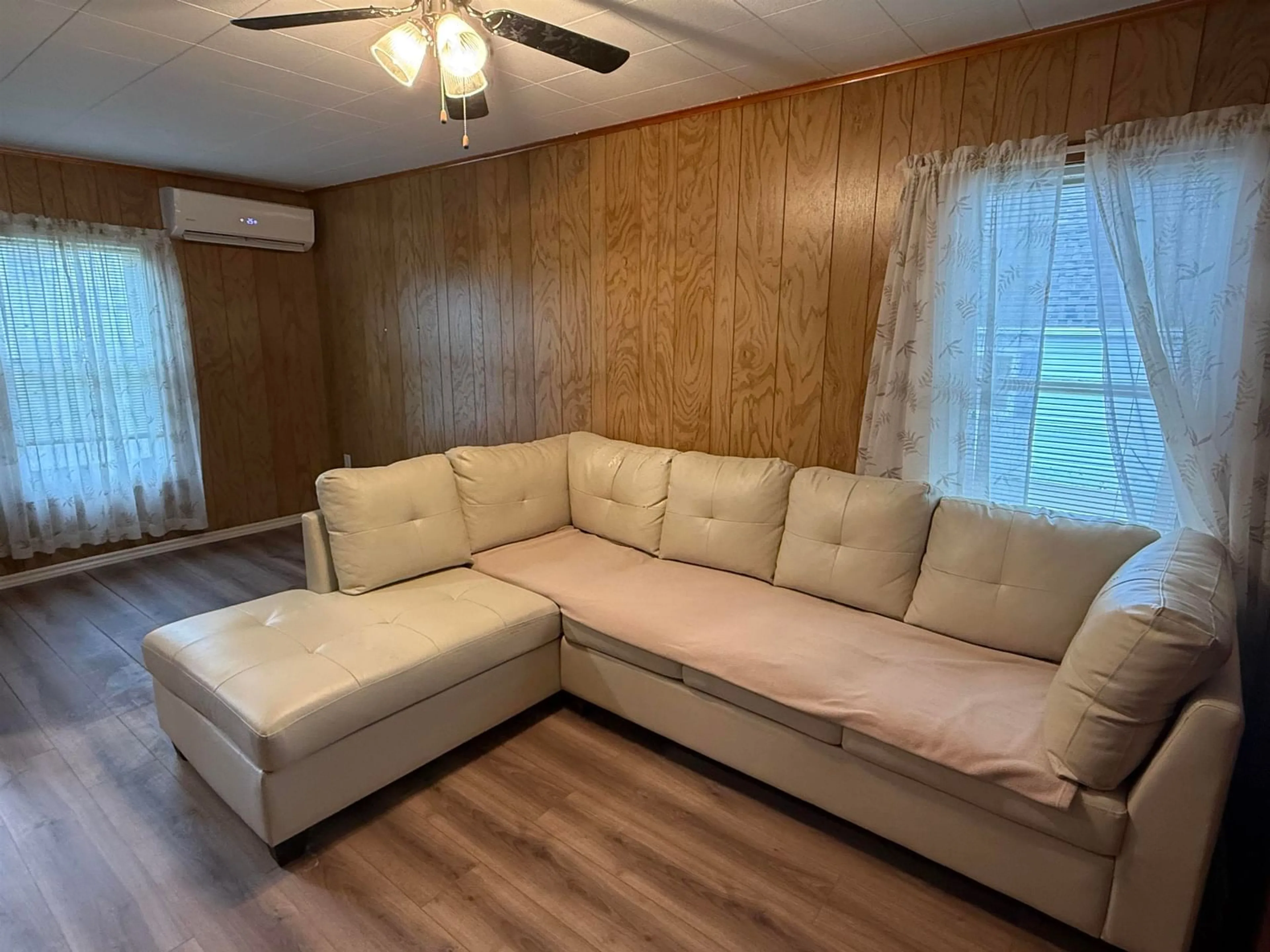 Living room with furniture, wood/laminate floor for 45 Martha St, Pictou Nova Scotia B0K 1H0