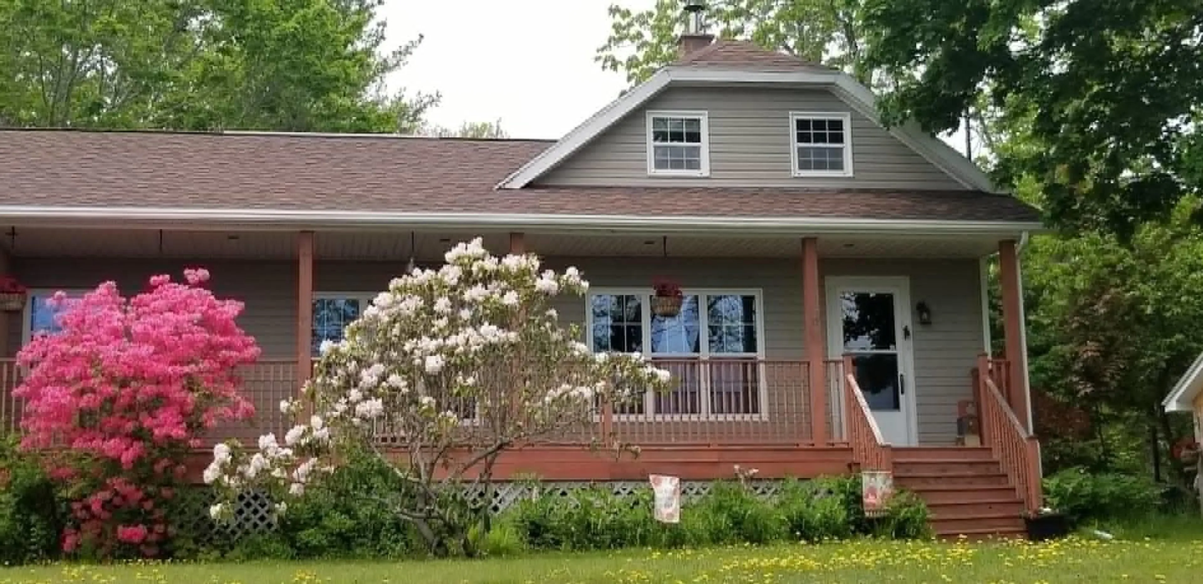 Home with vinyl exterior material, street for 202 White Point Rd, Liverpool Nova Scotia B0T 1K0