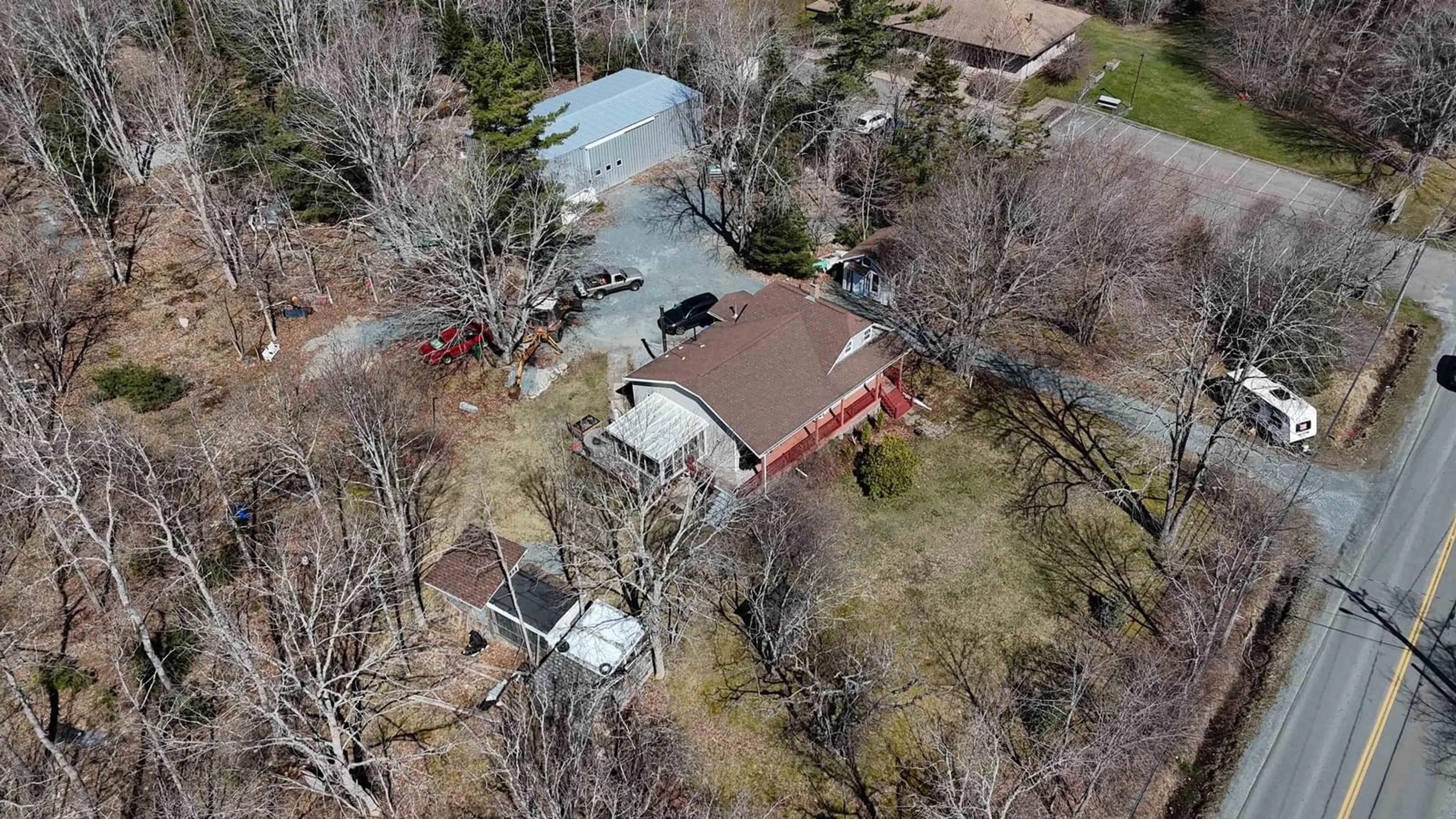 A pic from outside/outdoor area/front of a property/back of a property/a pic from drone, street for 202 White Point Rd, Liverpool Nova Scotia B0T 1K0